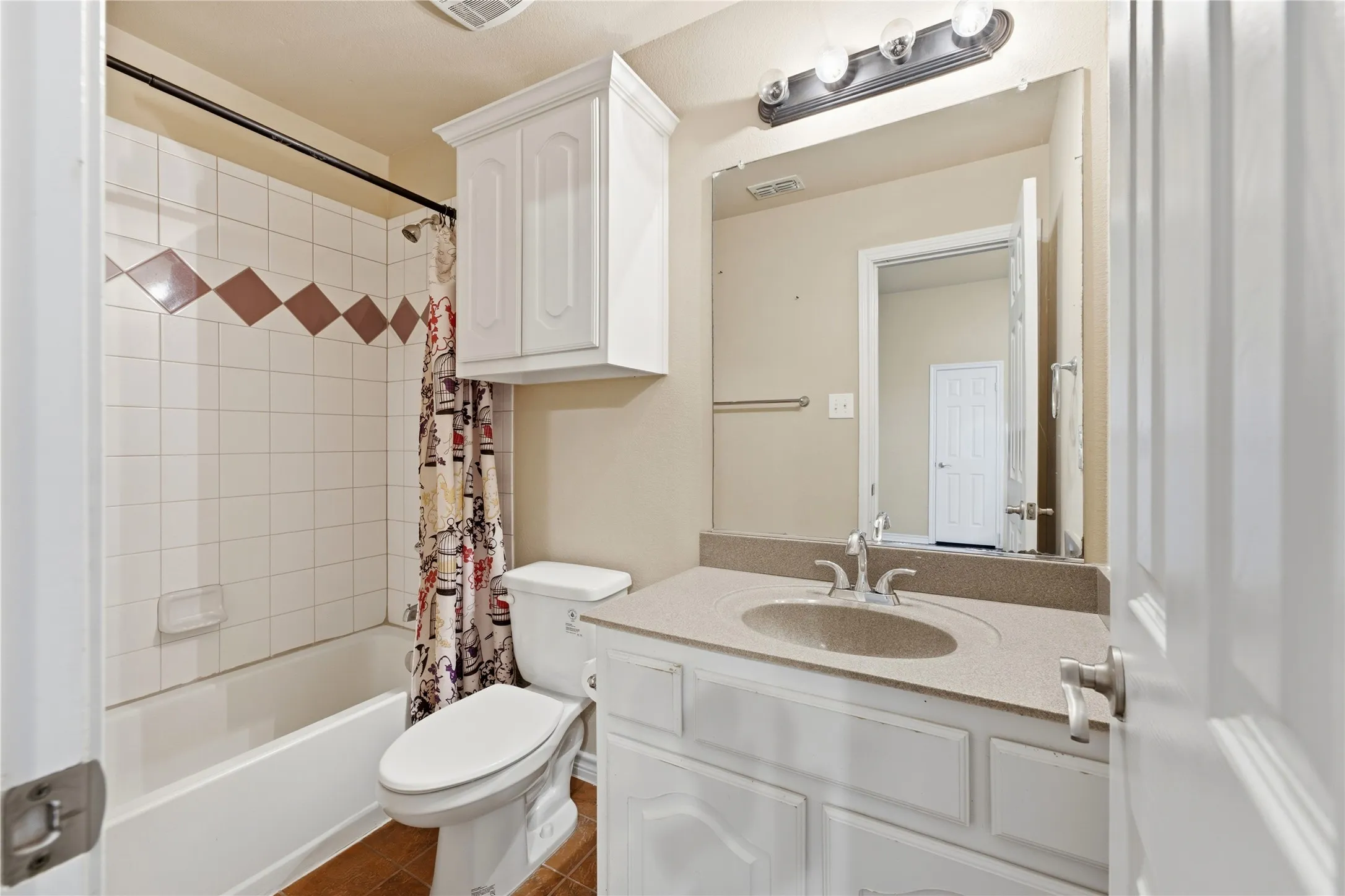 Timeless finishes create a clean, inviting space for everyday routines.