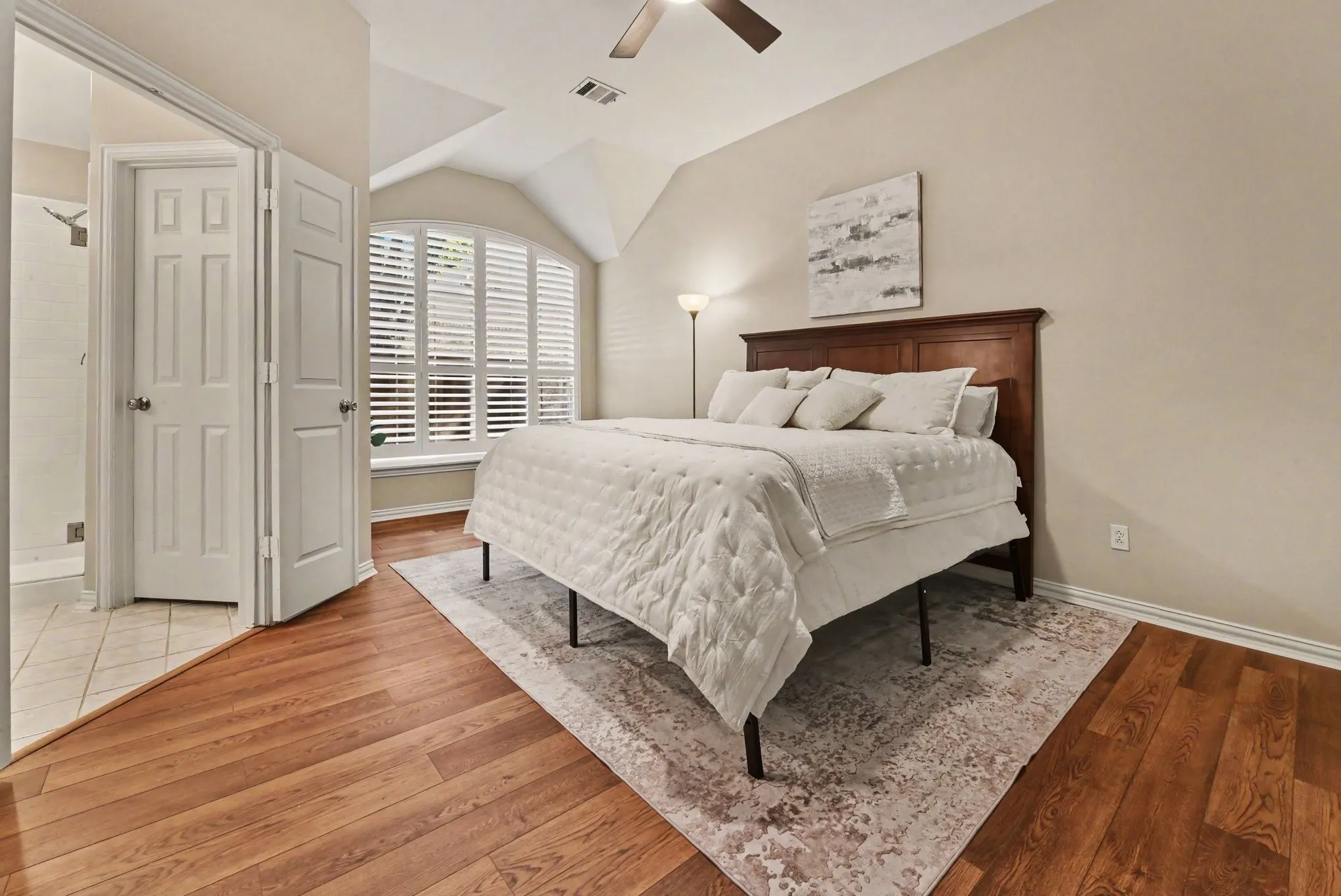 Primary bedroom with widow seat and room for sitting area