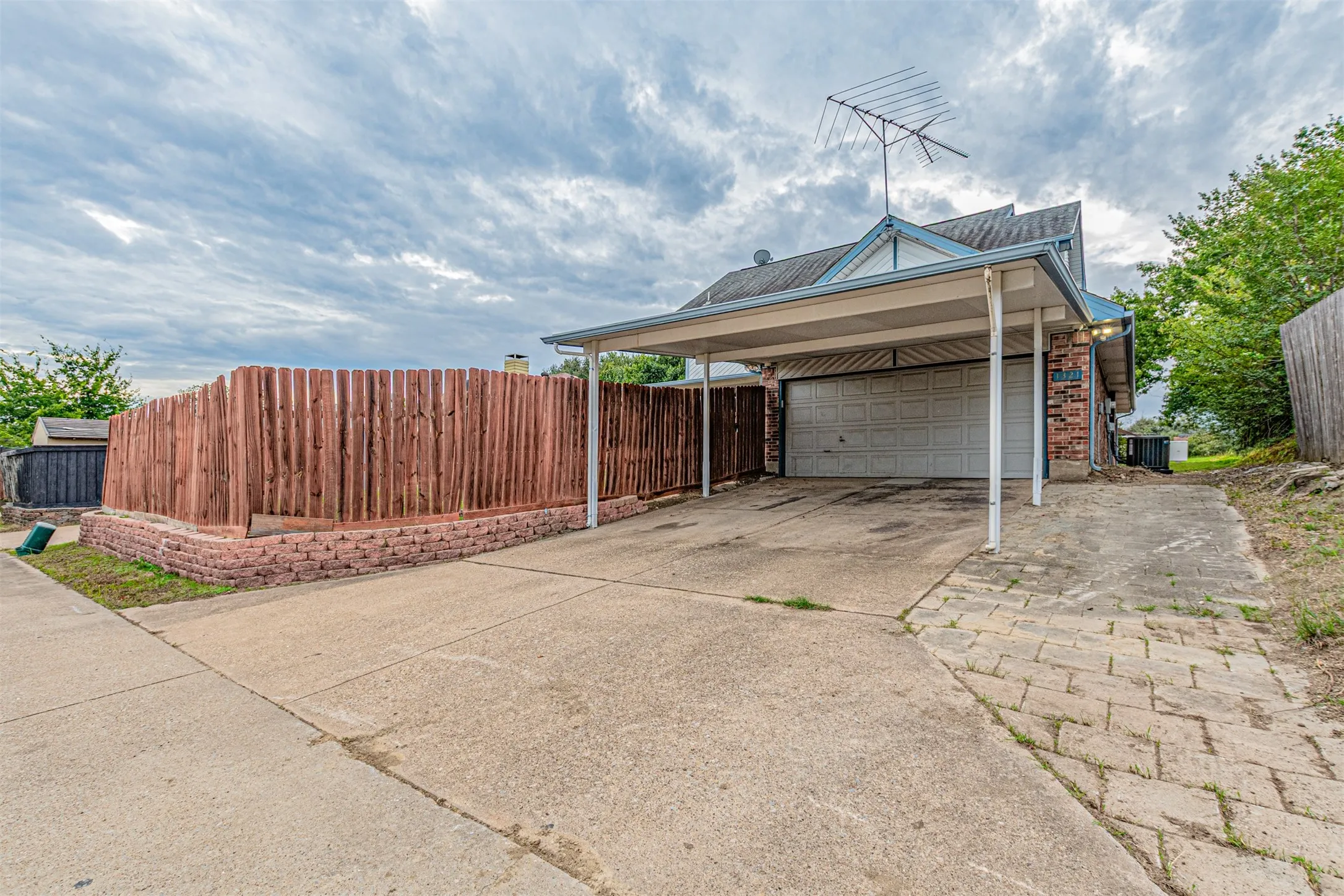 Rear alley entry carport and garage
