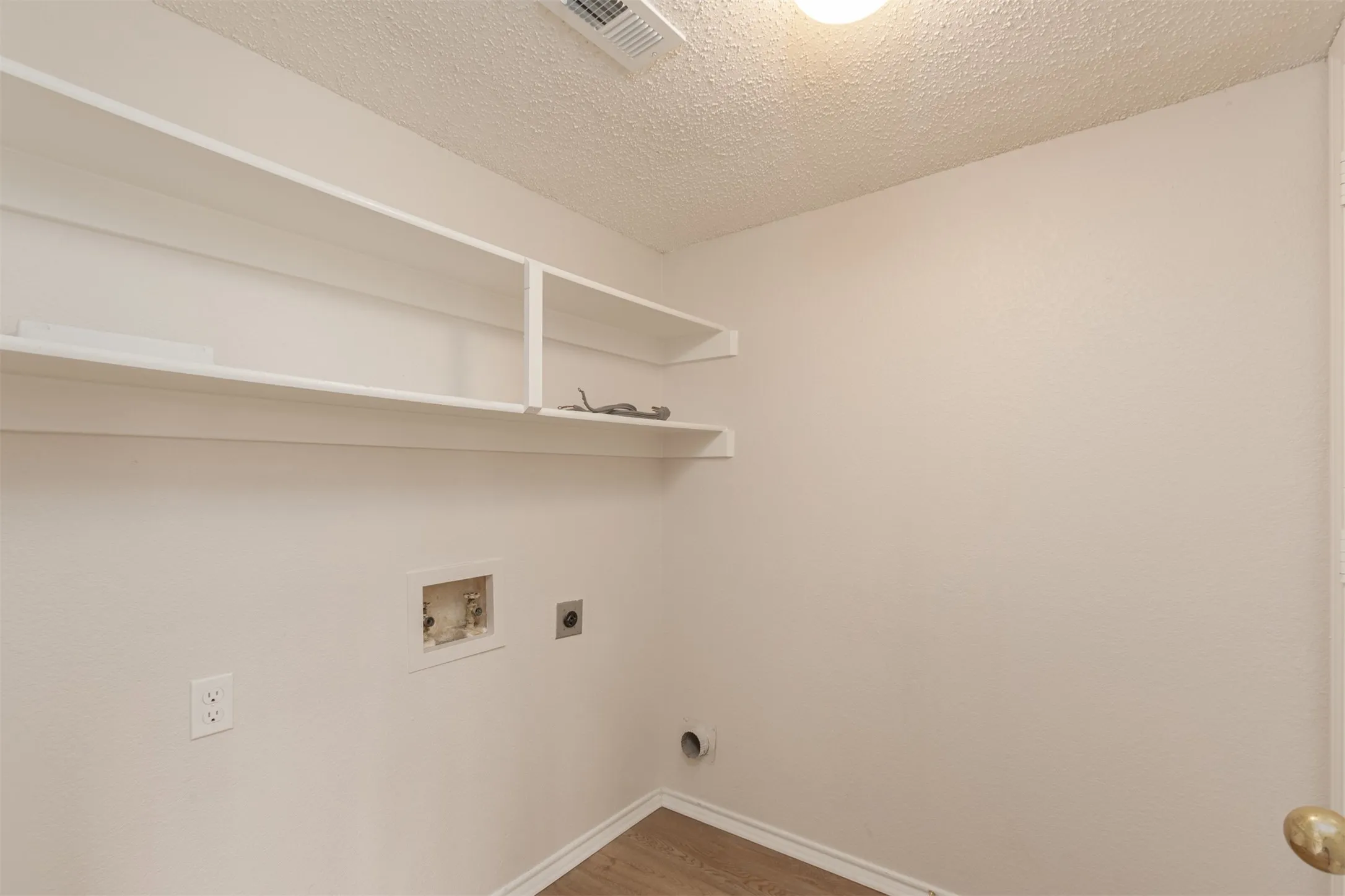 Enter laundry room from Kitchen or Garage