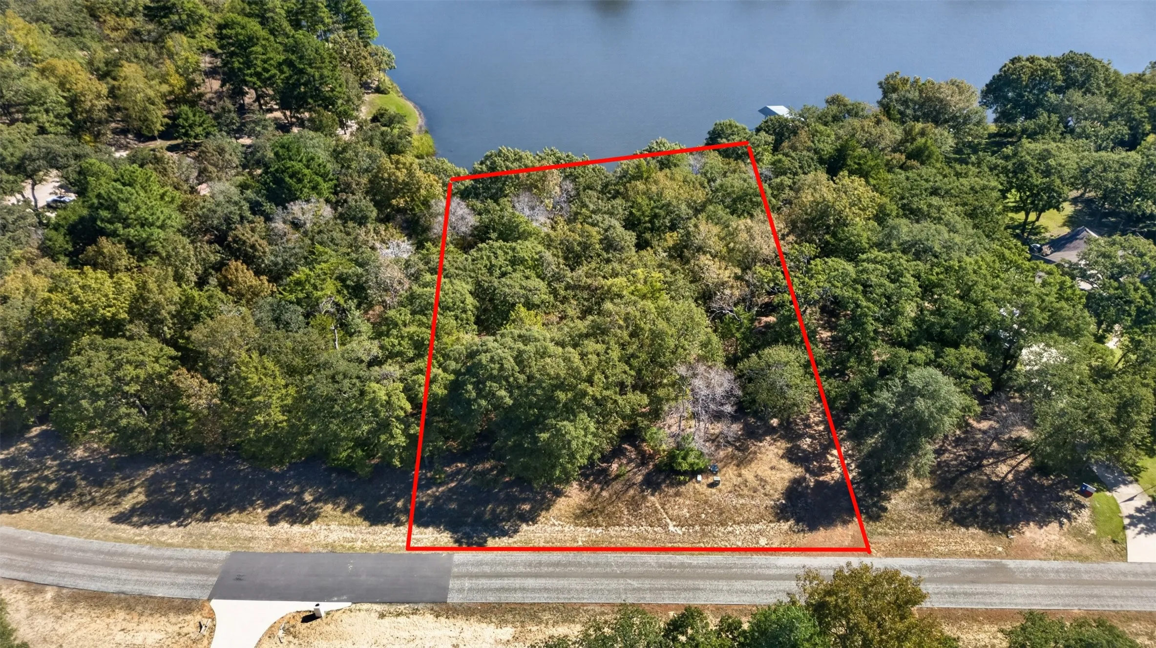 Wooded parcel featuring direct water frontage and mature trees