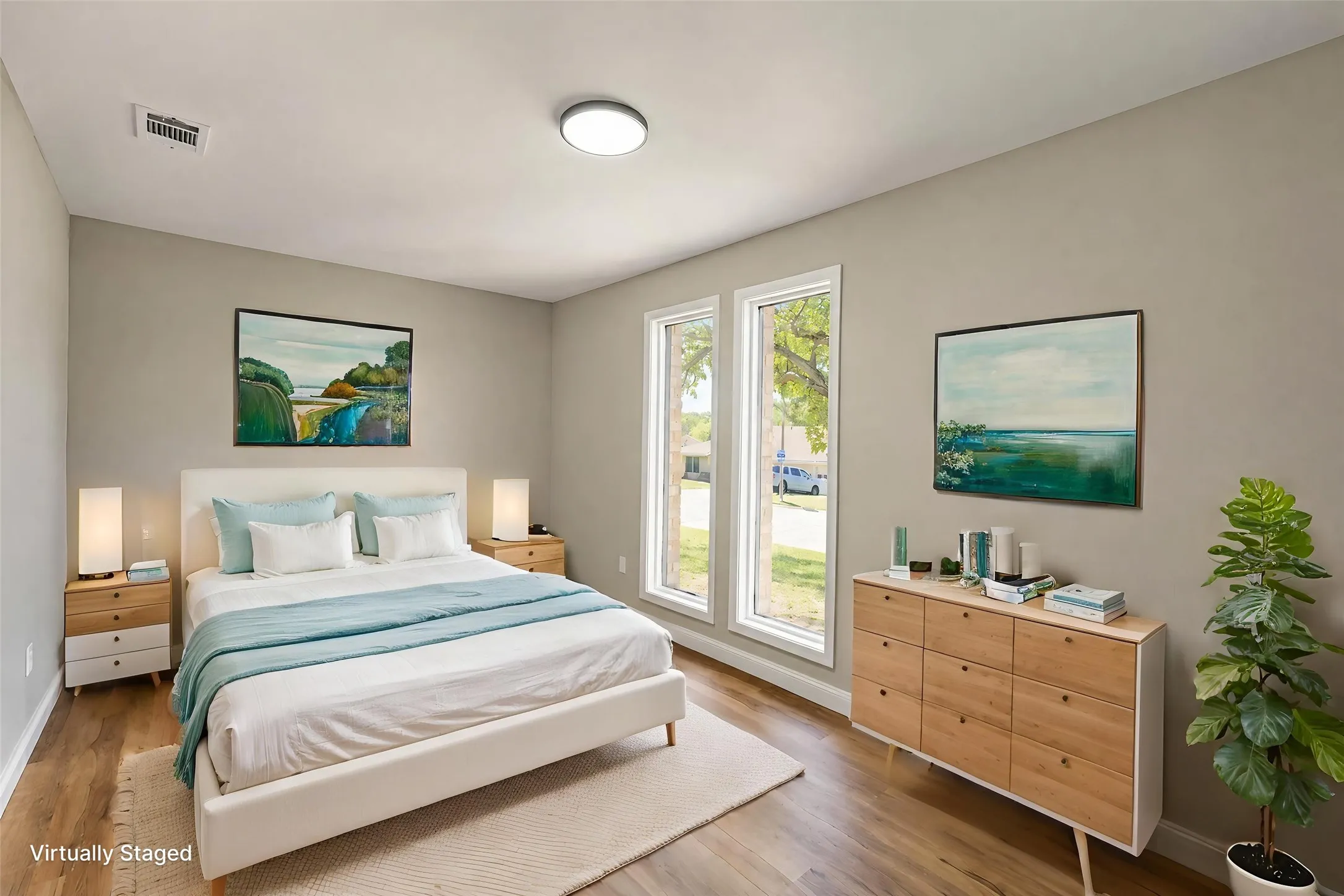 Room featuring wood-finish flooring, dual floor-to-ceiling windows, and a flush-mount light fixture