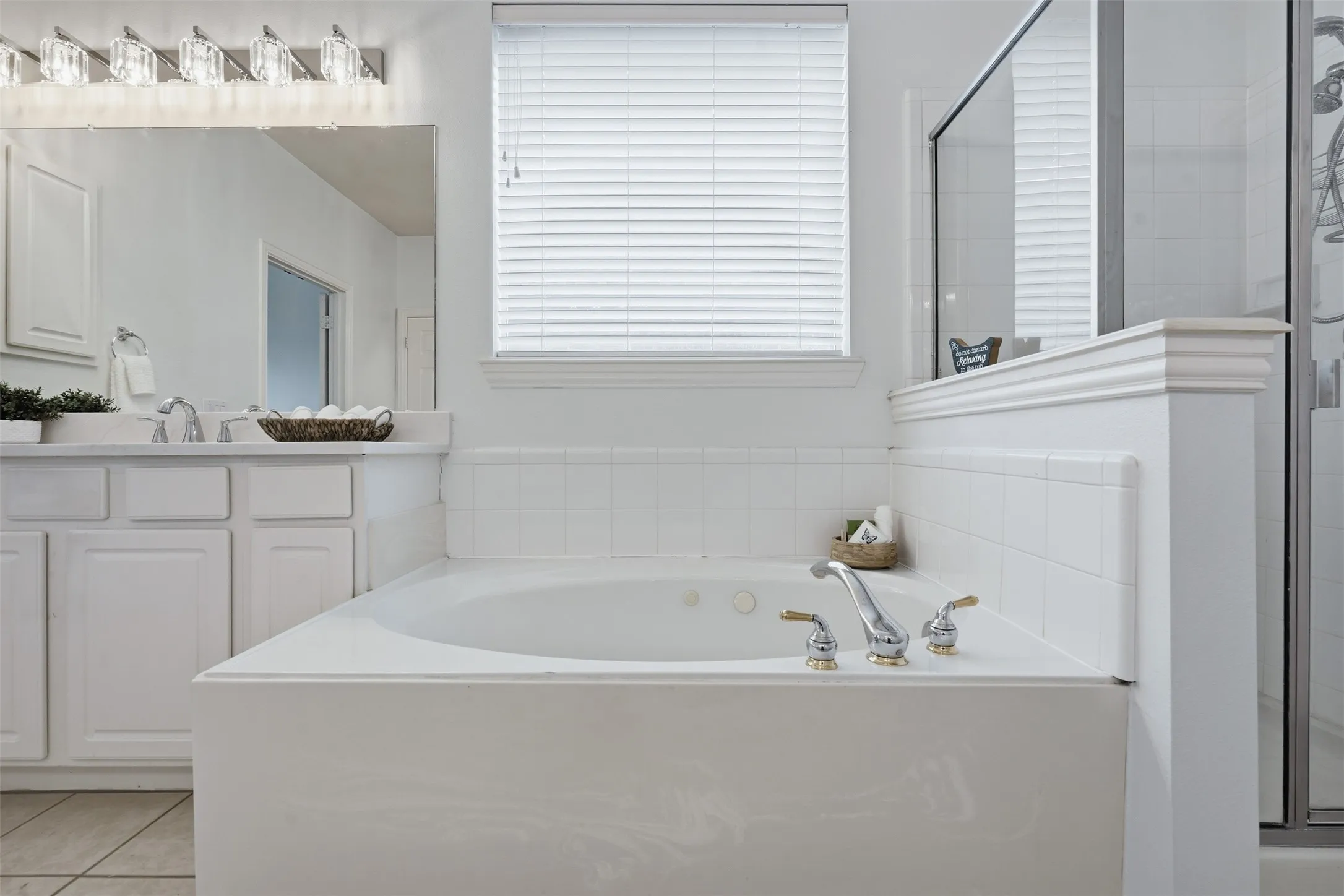 Relax in your spa jetted tub with separate shower.