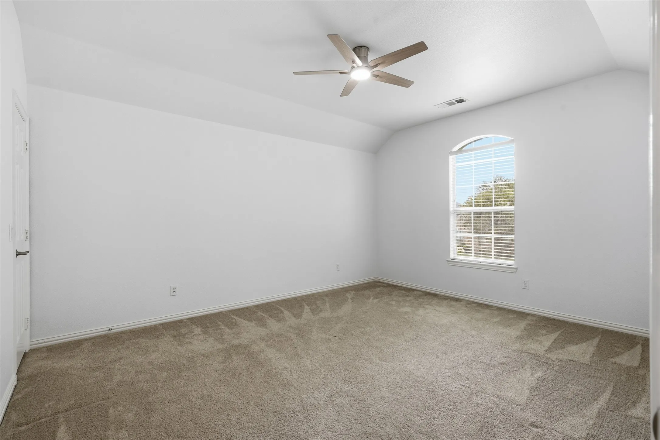 Bedroom with walk in closet.