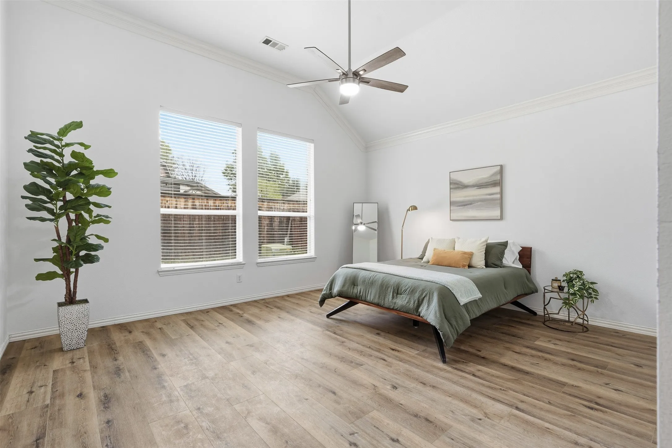 Large primary with room for sitting area.