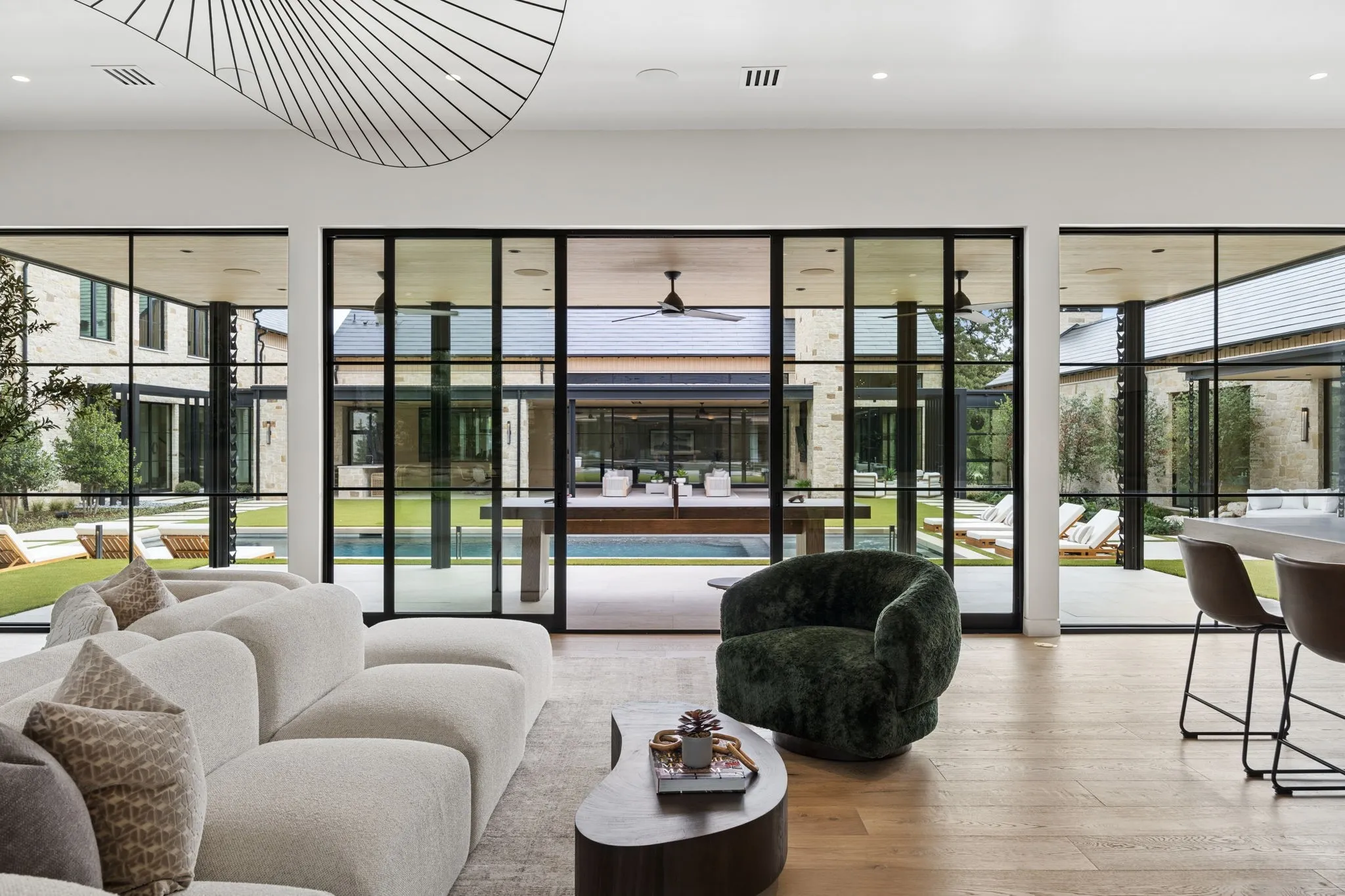 Separate Wellness Retreat with full Kitchen, Family Room, Wellness area with Infrared Sauna + Cold Plunge, and separate Guest Bedroom with ensuite Bath.