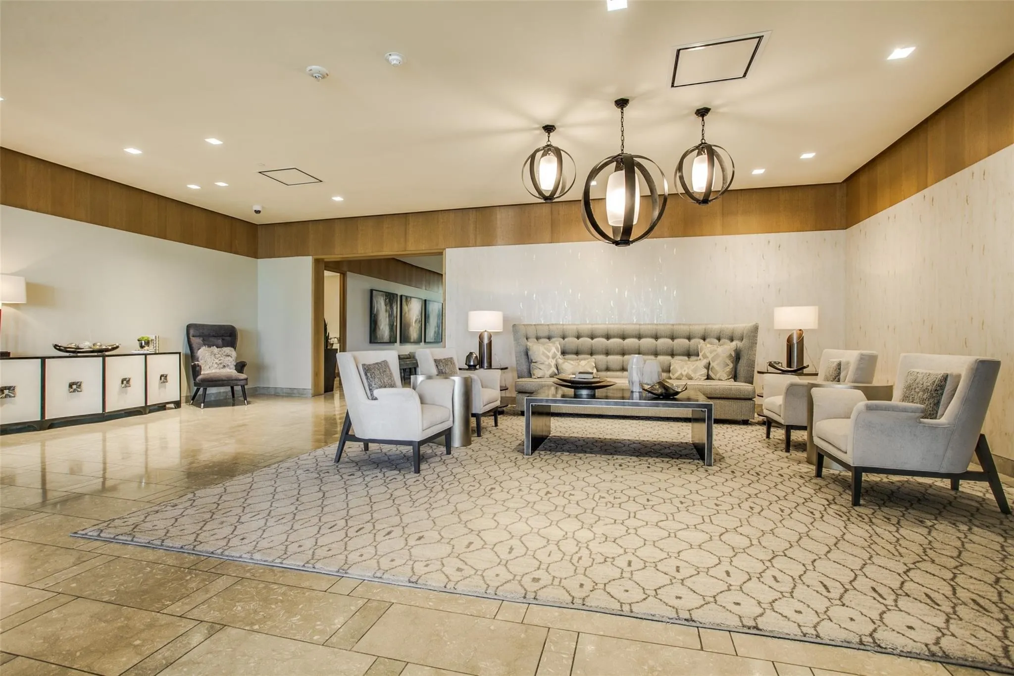Lovely sitting area in building entrance to welcome guests.