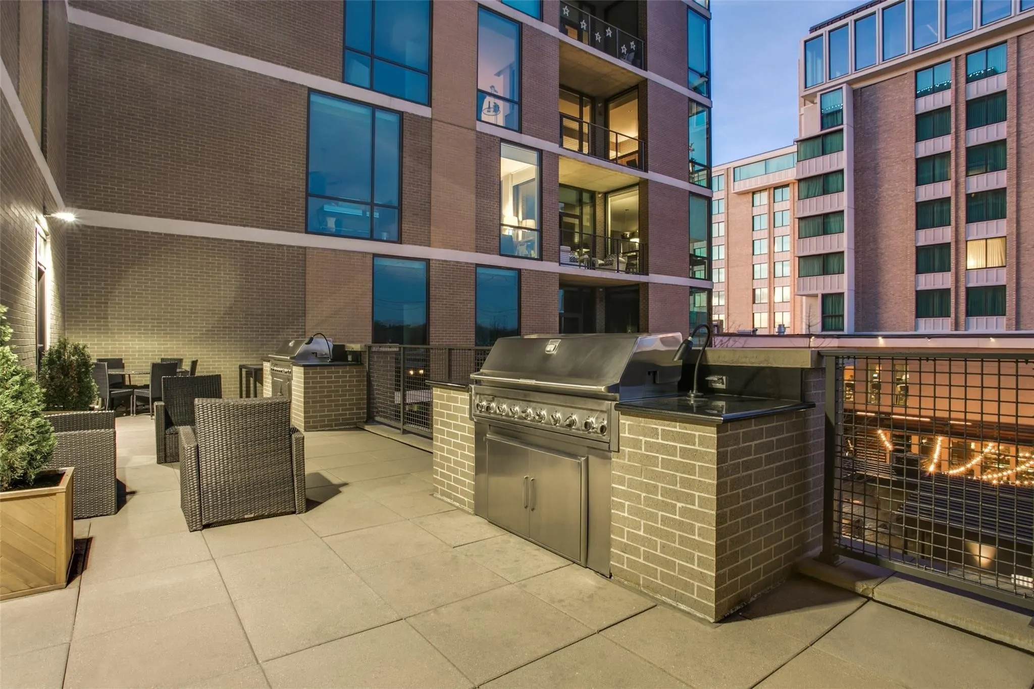 Private Residents' Grilling Area with 2 grills, tables & chairs