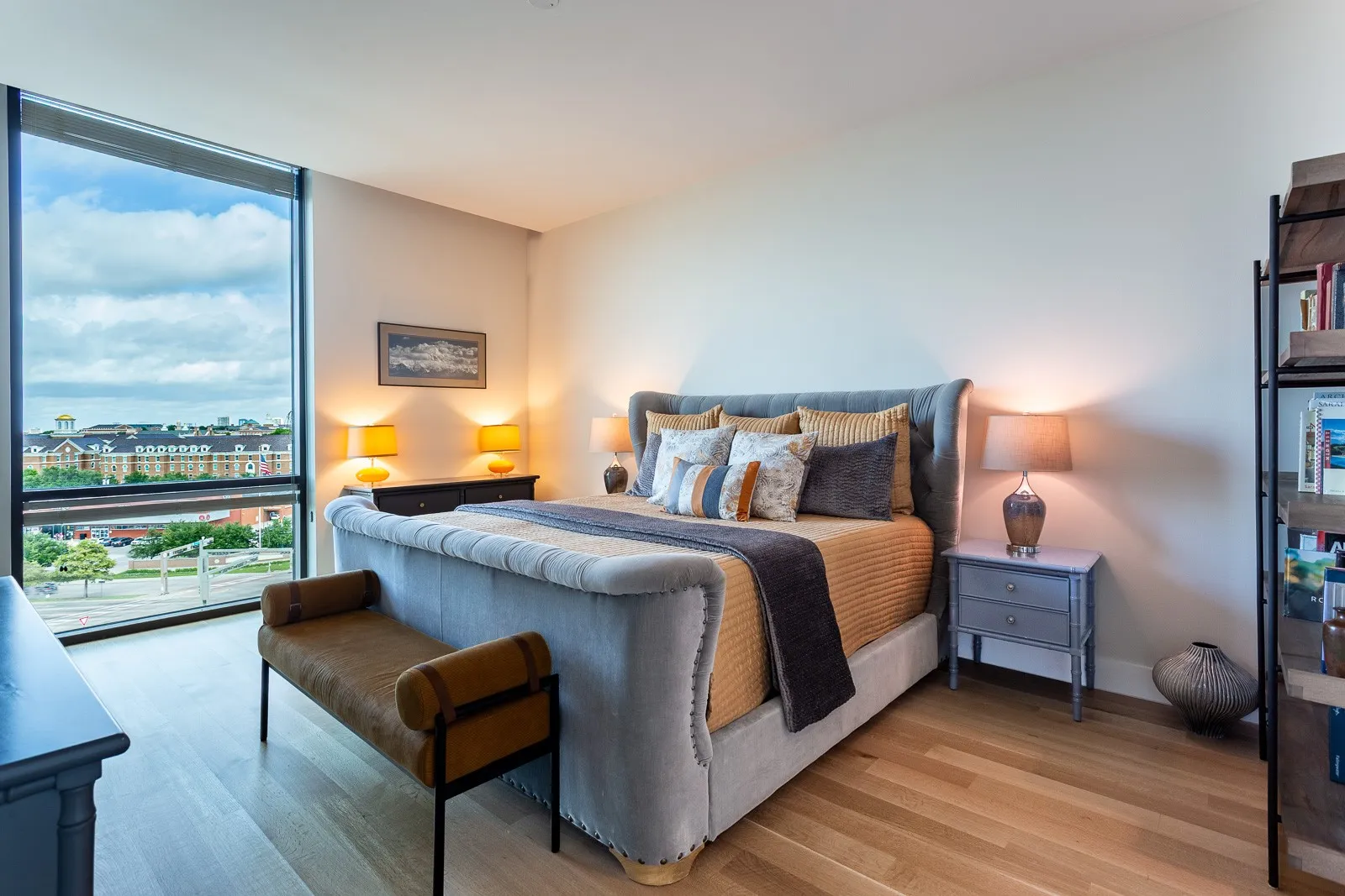 Large Primary Bedroom with wood floors.