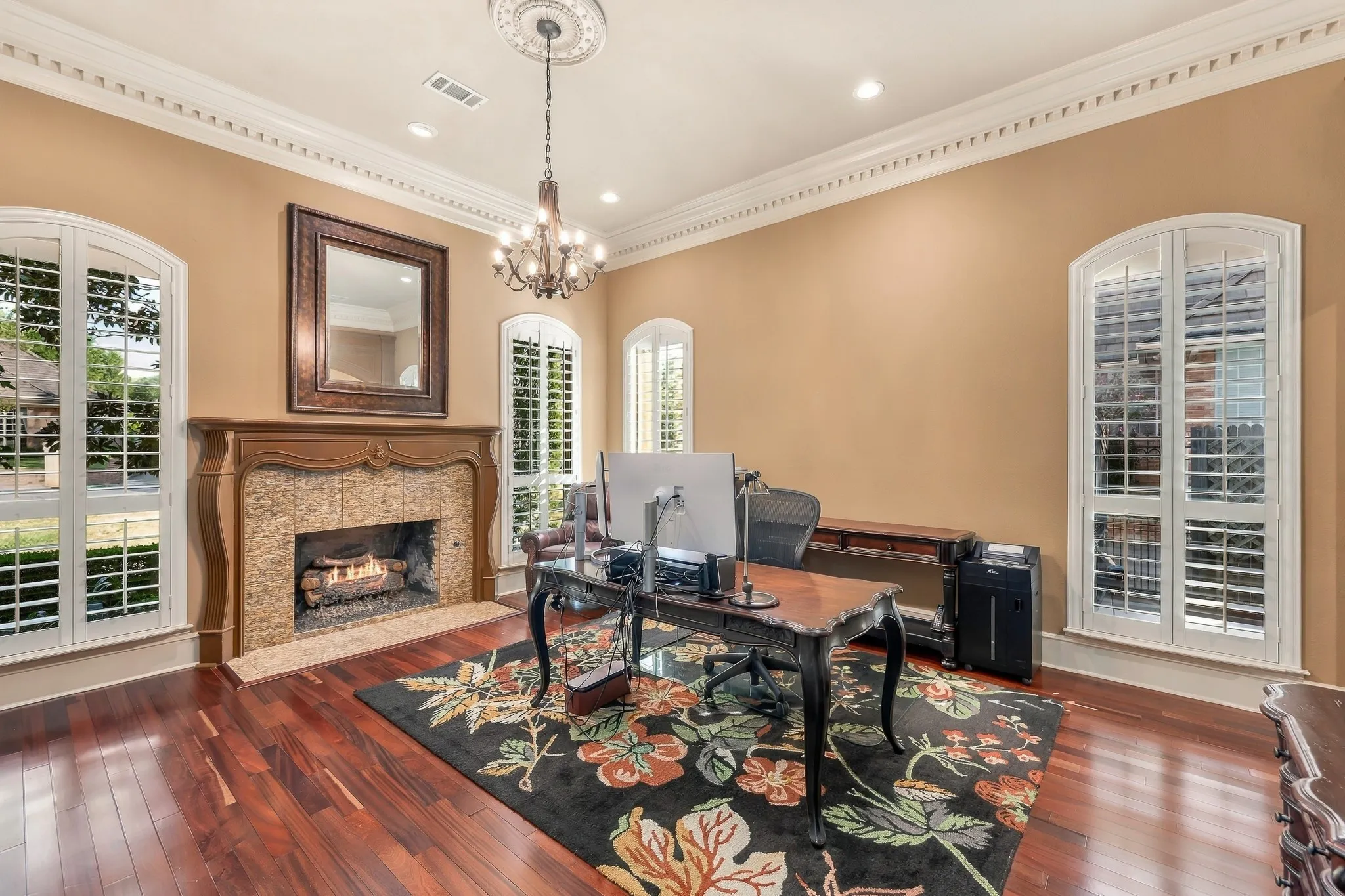 Livingroom used as office w fireplace & bar area