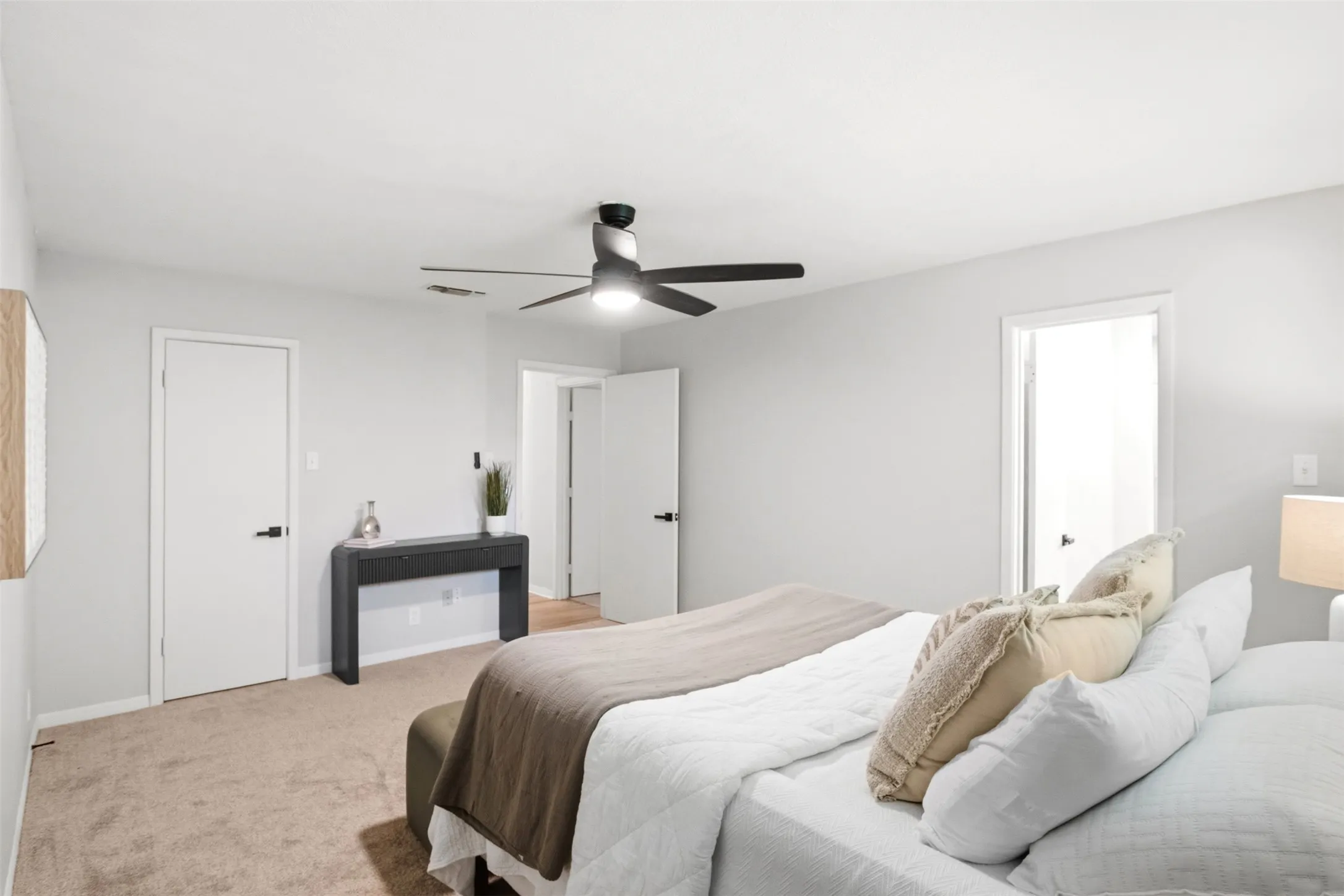 The primary suite includes two closets, adding valuable storage and organization options.