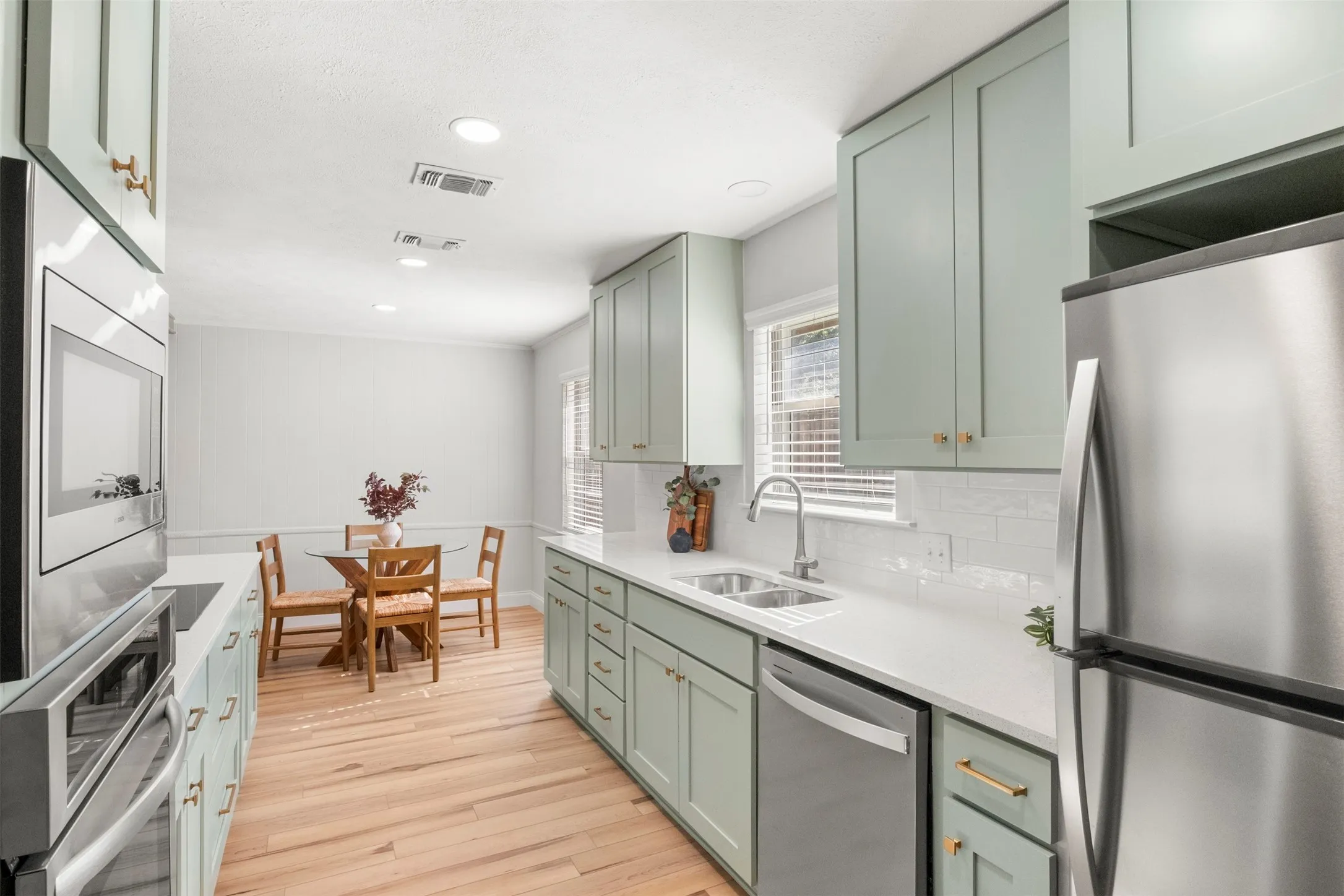 Generous cabinet and counter space make meal prep, storage, and entertaining easier.