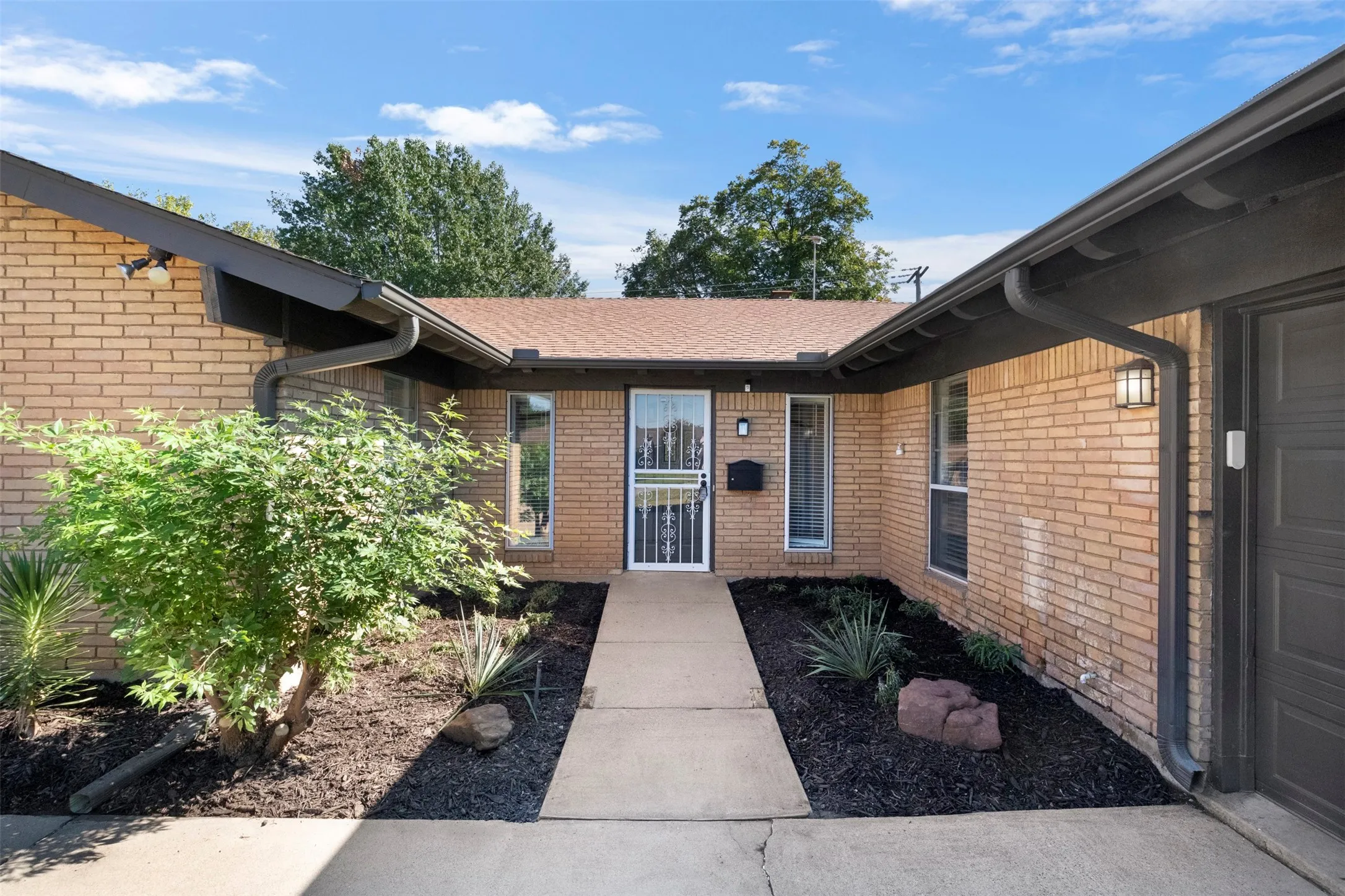 A welcoming entry sets the tone for a home that preserves its original character while embracing modern updates.