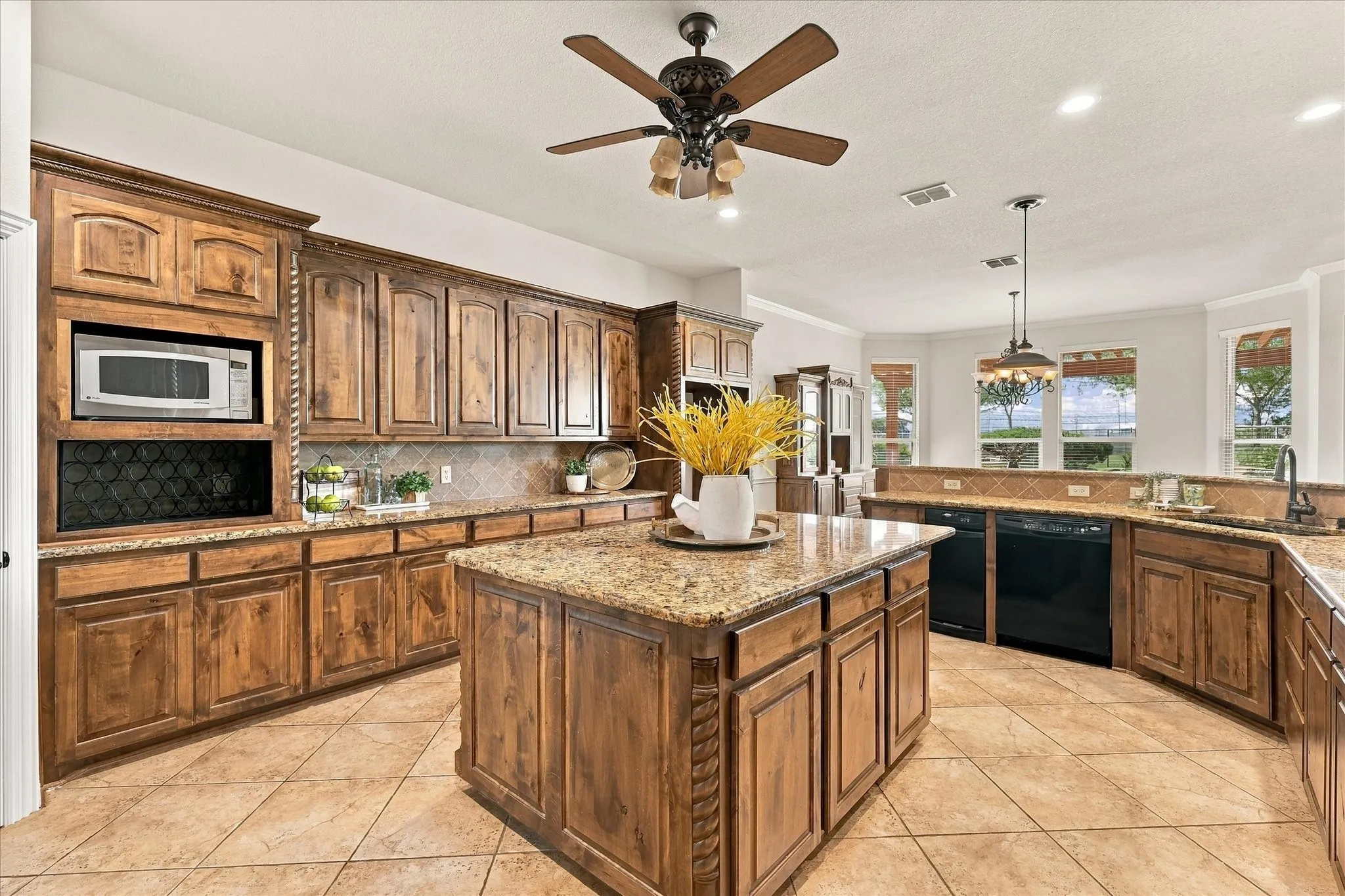 Exquisite views through dining area to back acreage.  Dishwasher and trash compactor.