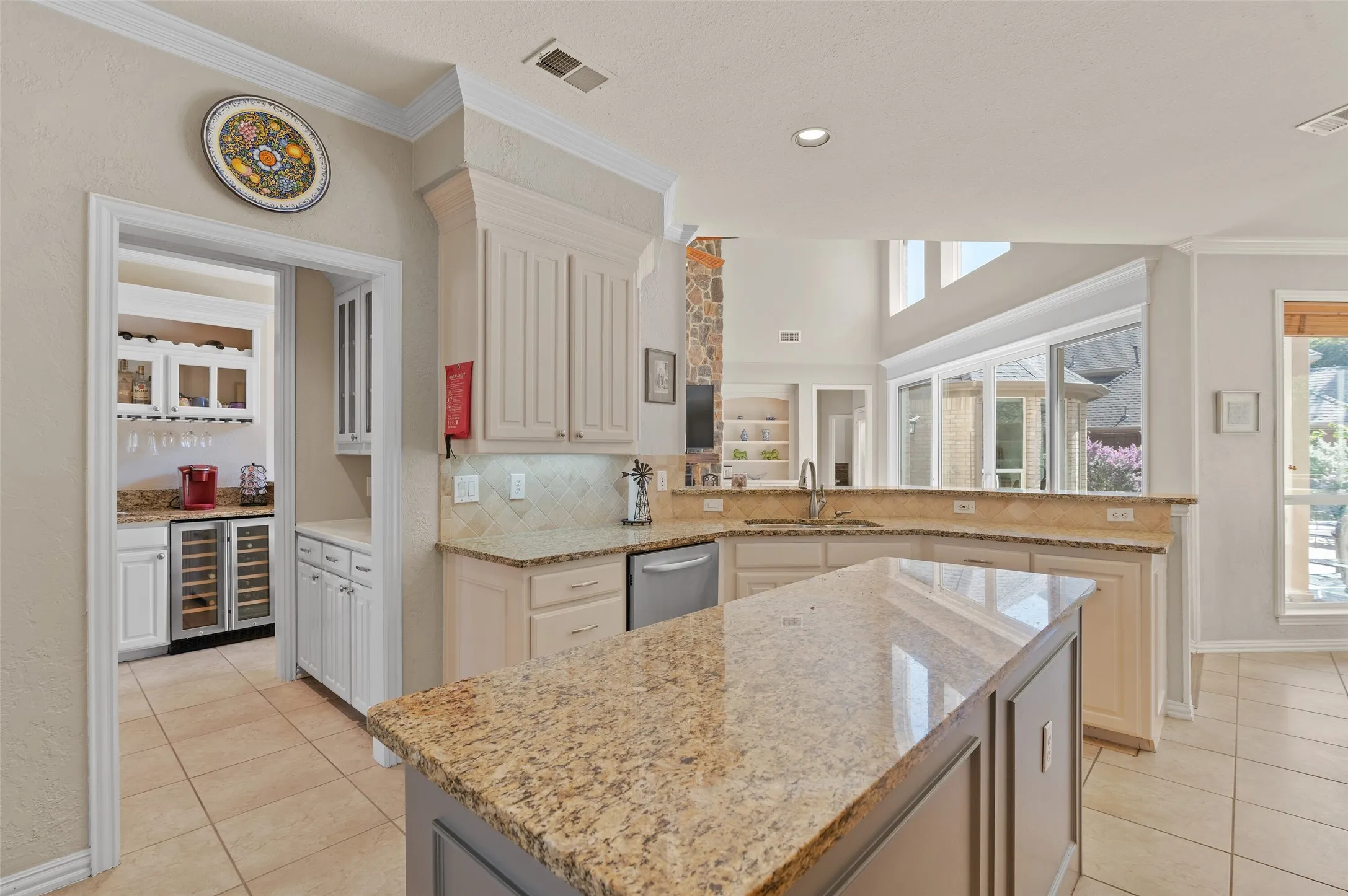 Large Island in this elegant kitchen overlooking the Family room!