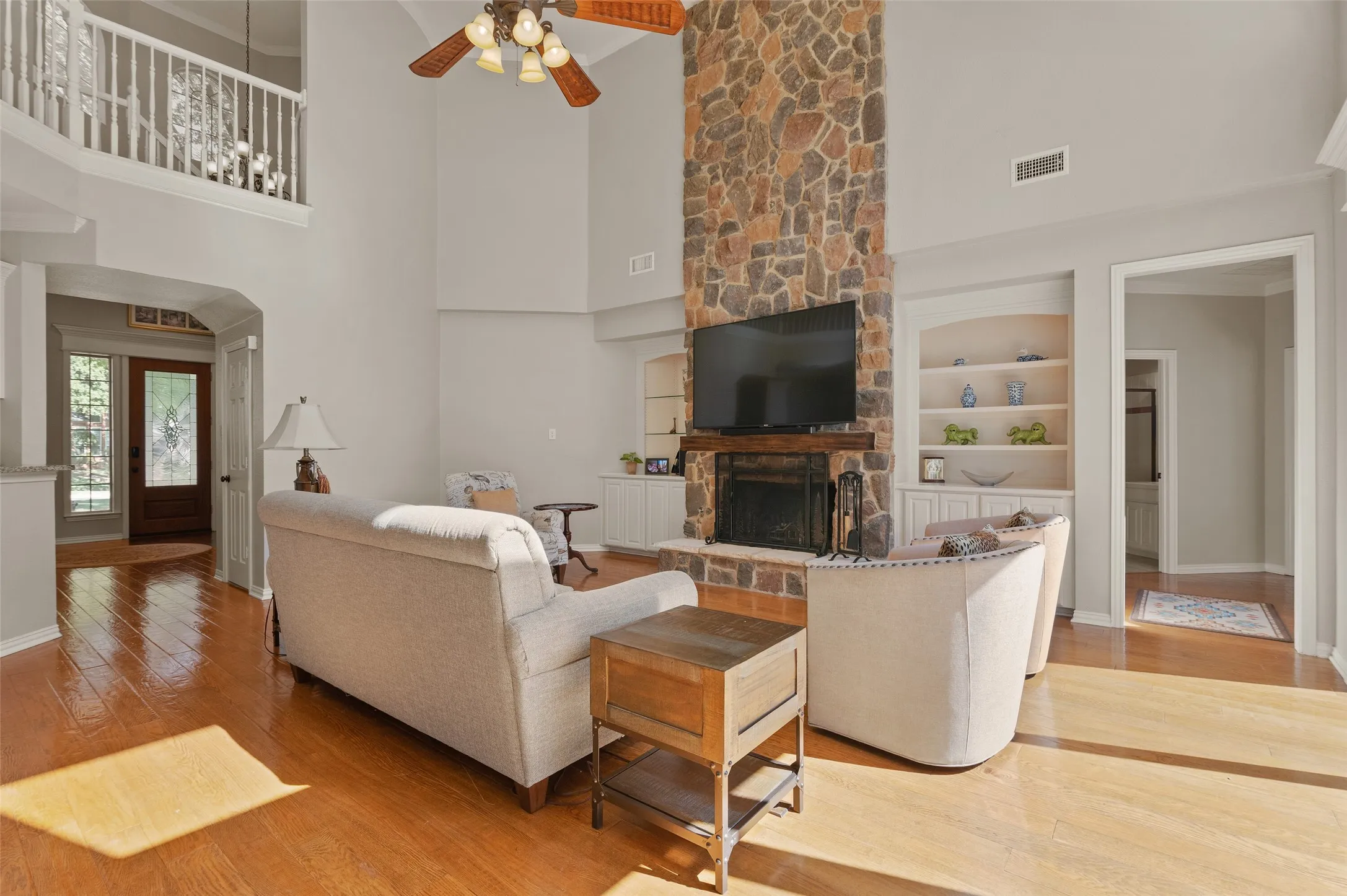 Open Floor plan with vaulted ceilings and  beautiful wood flooring!