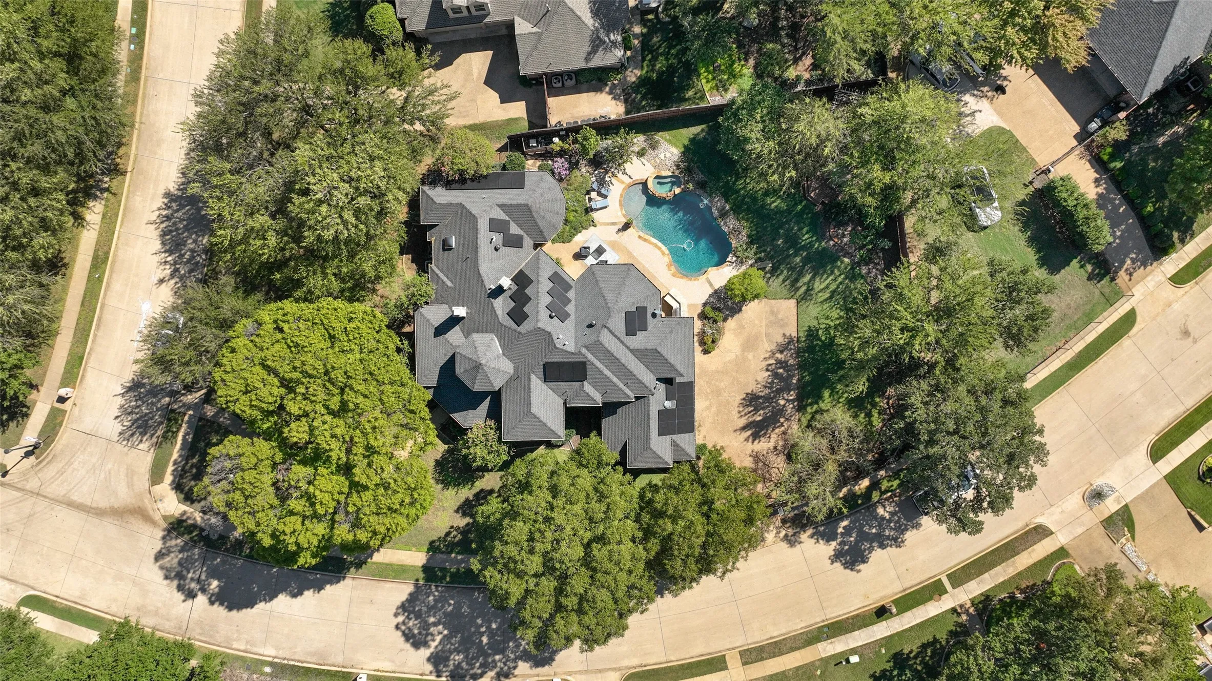 Private and beautifully treed lot! Electric gate entry!