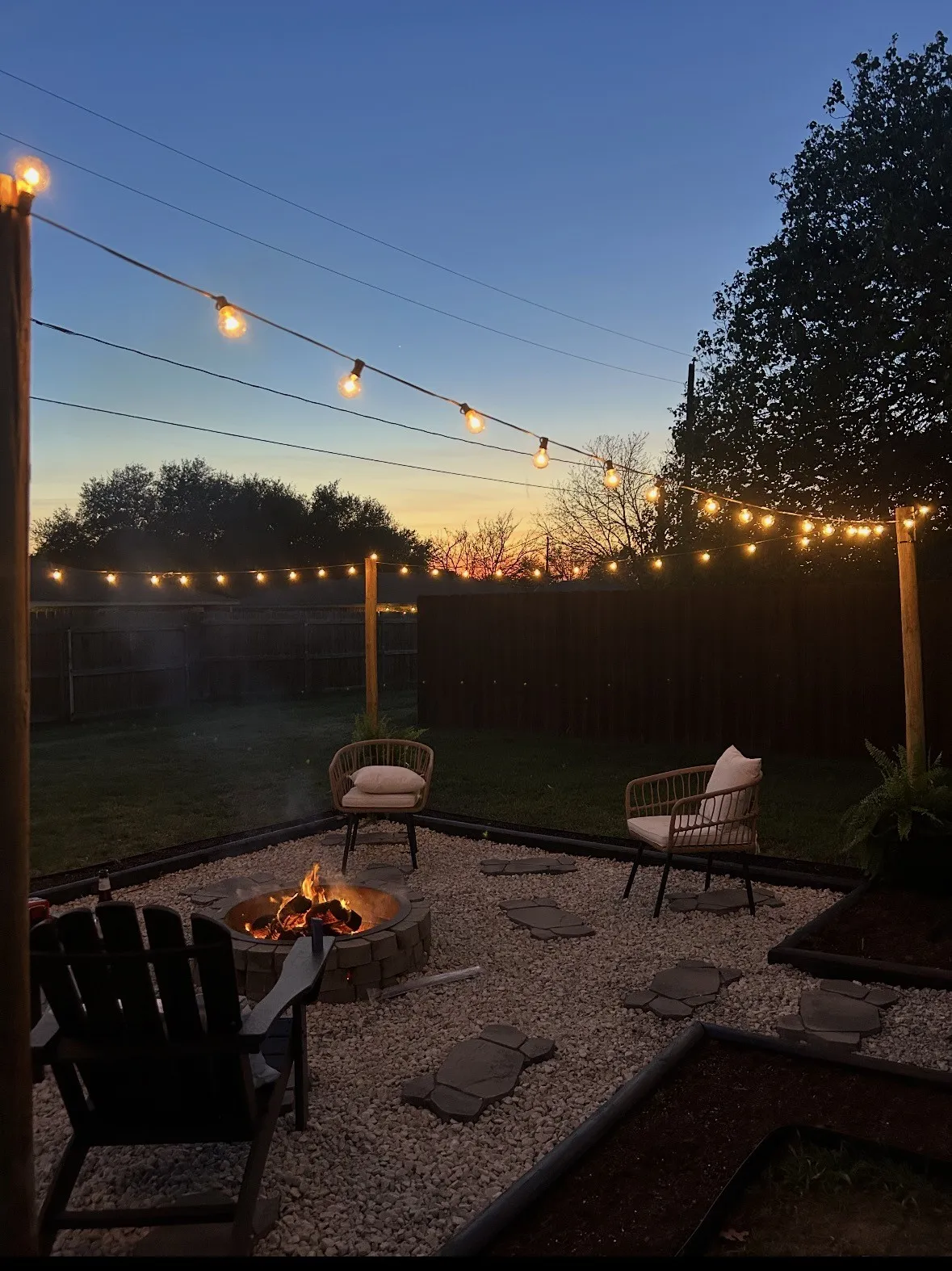 UPGRADED SODDED BACKYARD FEATURES FIREPIT & AMBIENCE LIGHTING FOR QUITE EVENINGS OR FRIENDS & FAMILY GATHERINGS
