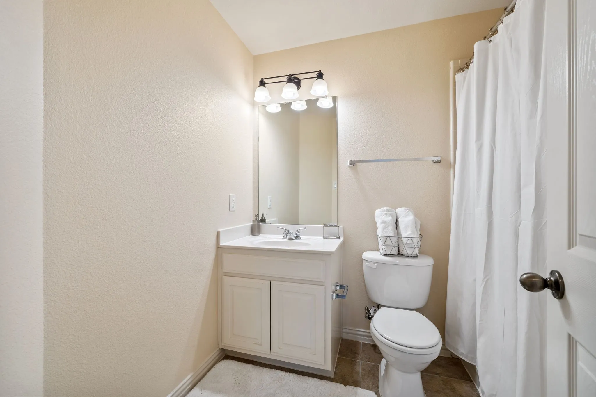 guest bathroom in the downstairs hallway
