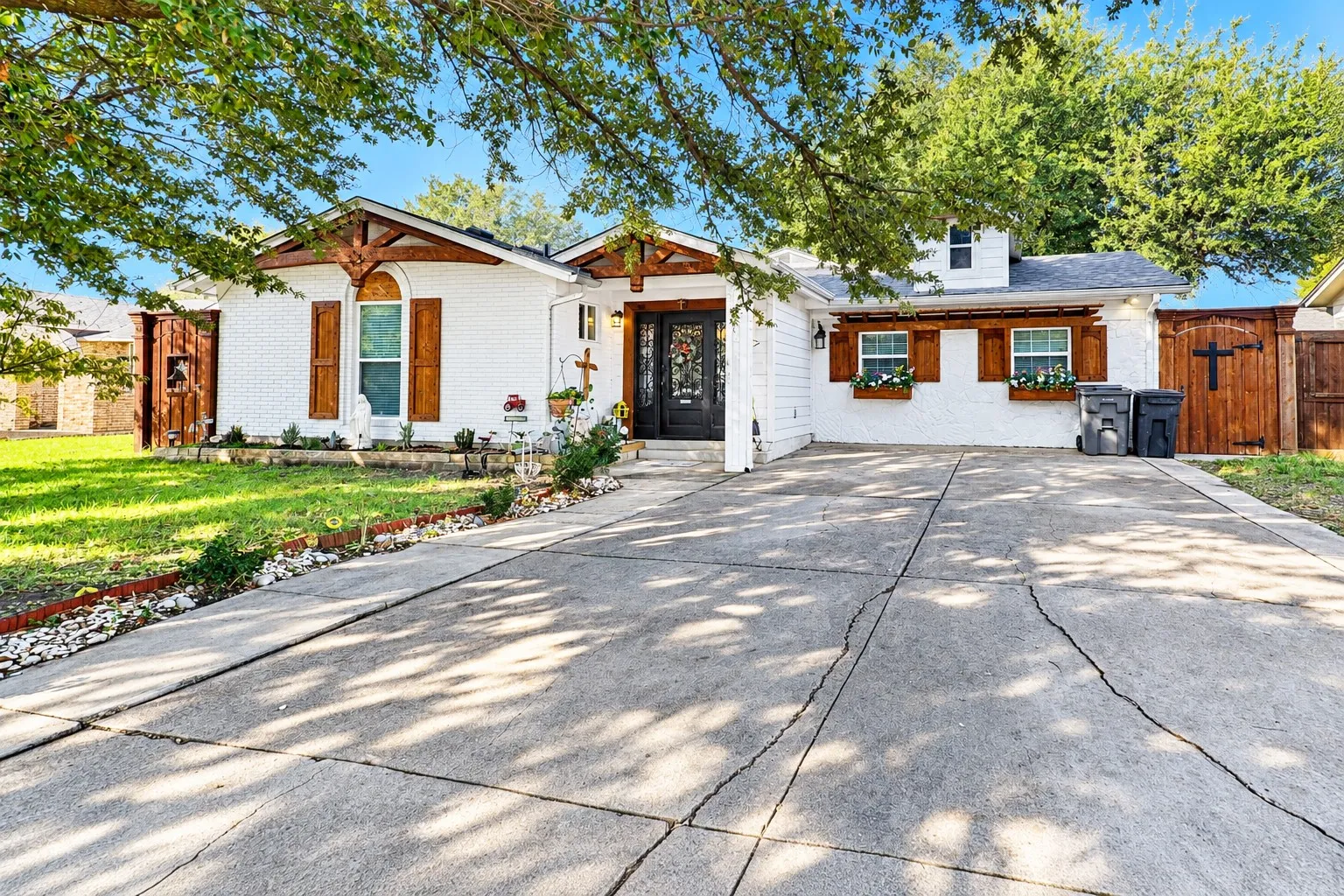 White brick façade, rustic wood accents