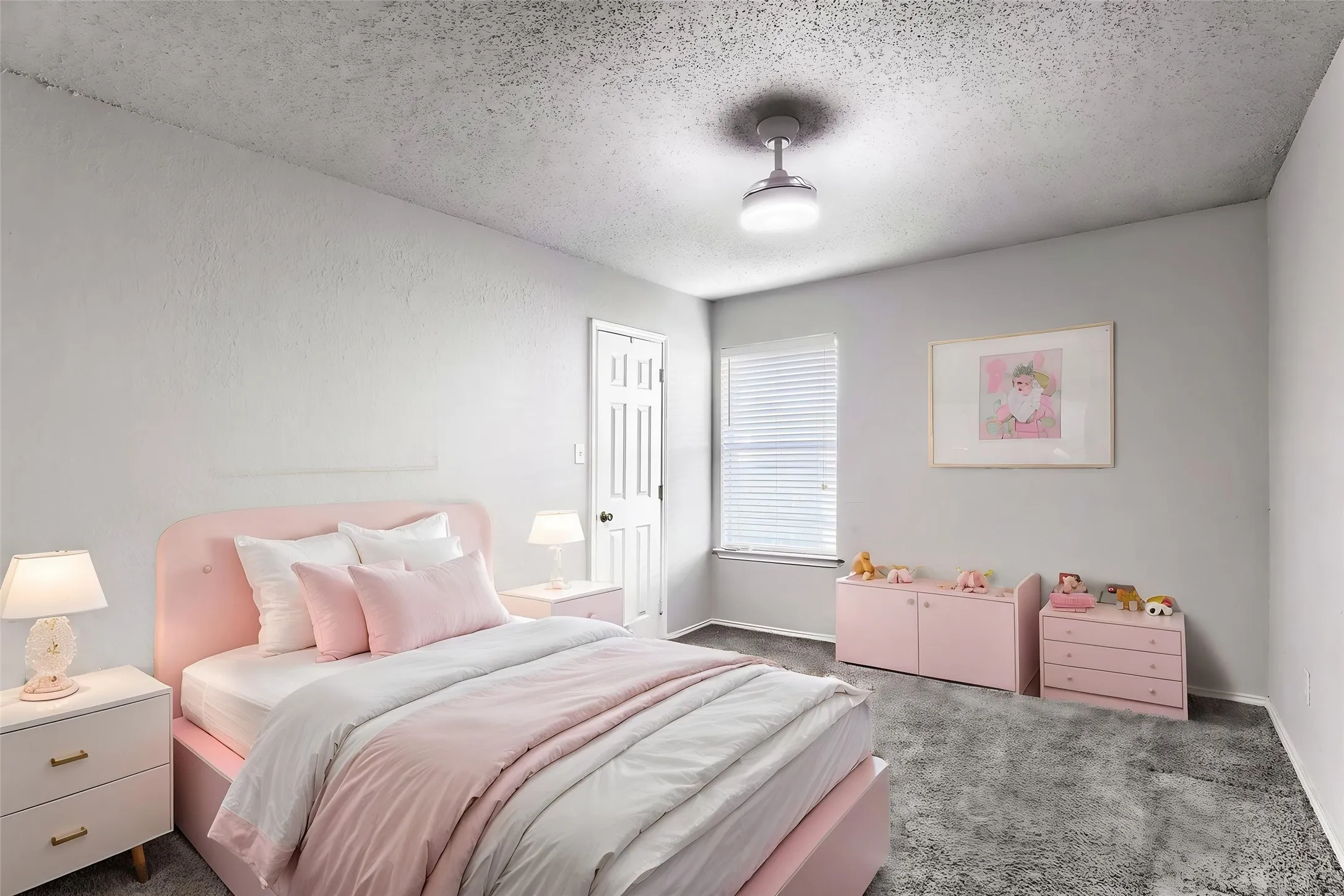 Room featuring neutral wall finishes, grey carpeting, a multi-panel interior door, and a ceiling-mounted light fixture