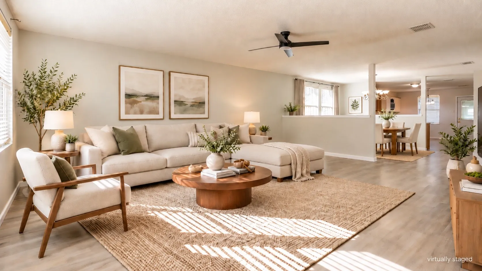 Virtually staged living room with modern furniture with ample space for multiple seating options and an entertaining