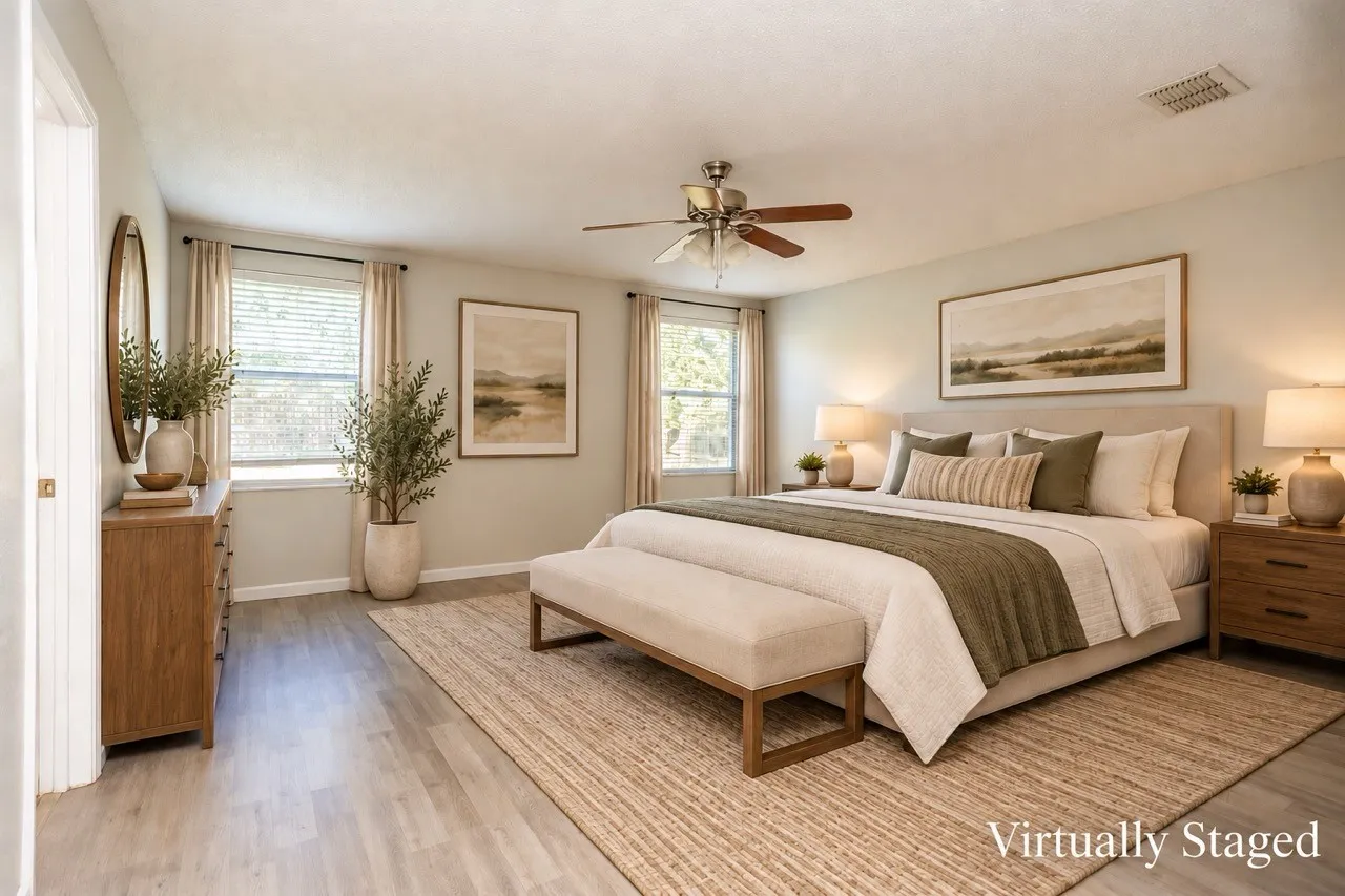 Explore the possibilities with this virtually staged primary bedroom with light and modern decor.