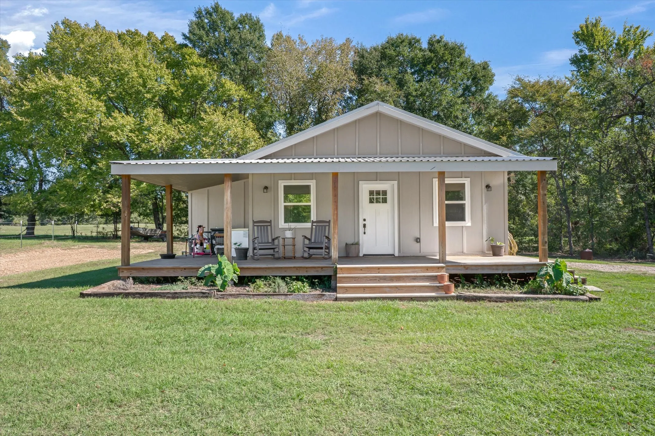 2nd tiny home has two bedrooms and one full bath and full kitchen and living room. The views from the porch on this home are breathtaking!