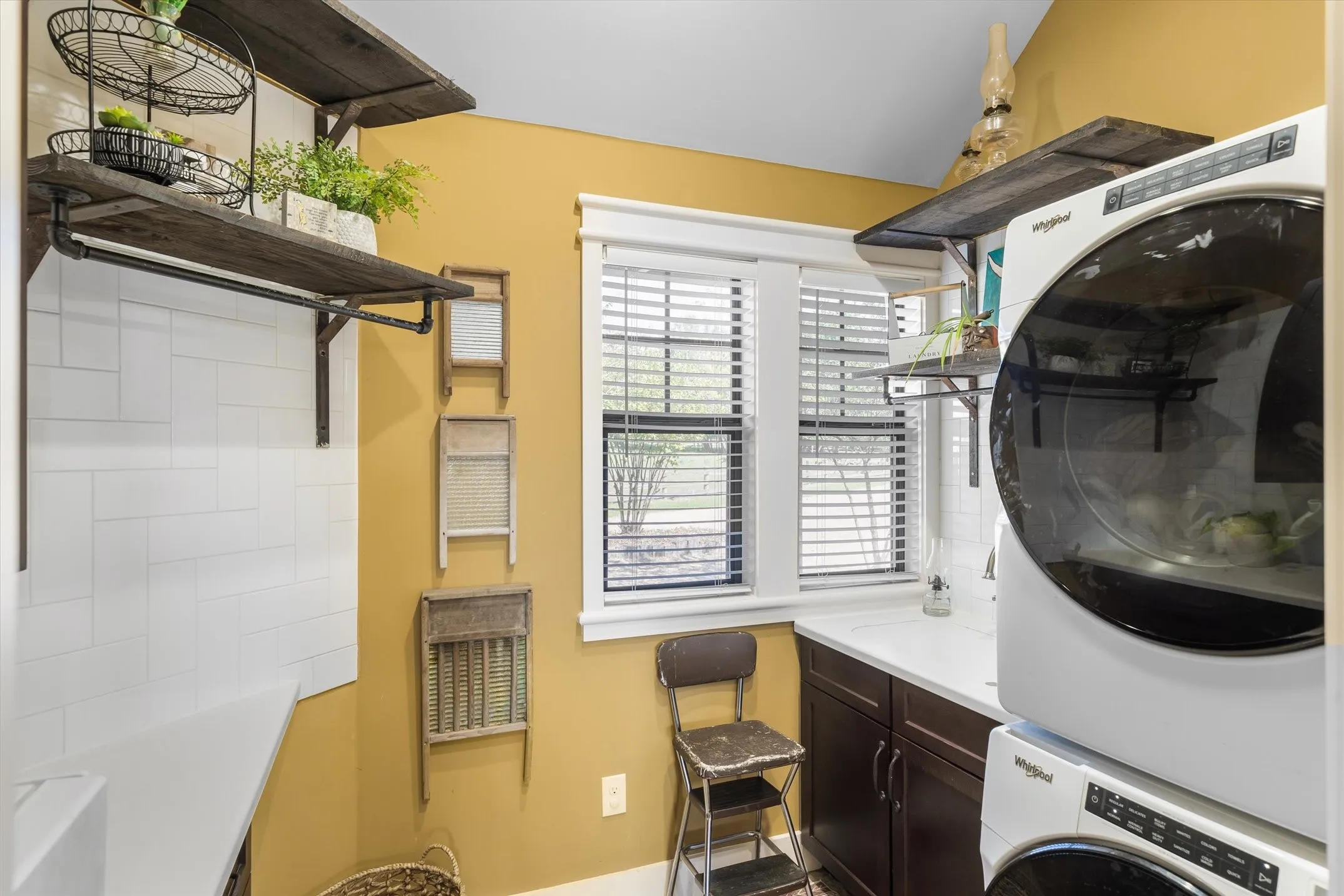 Great work space and laundry room just off the kitchen and a half bath