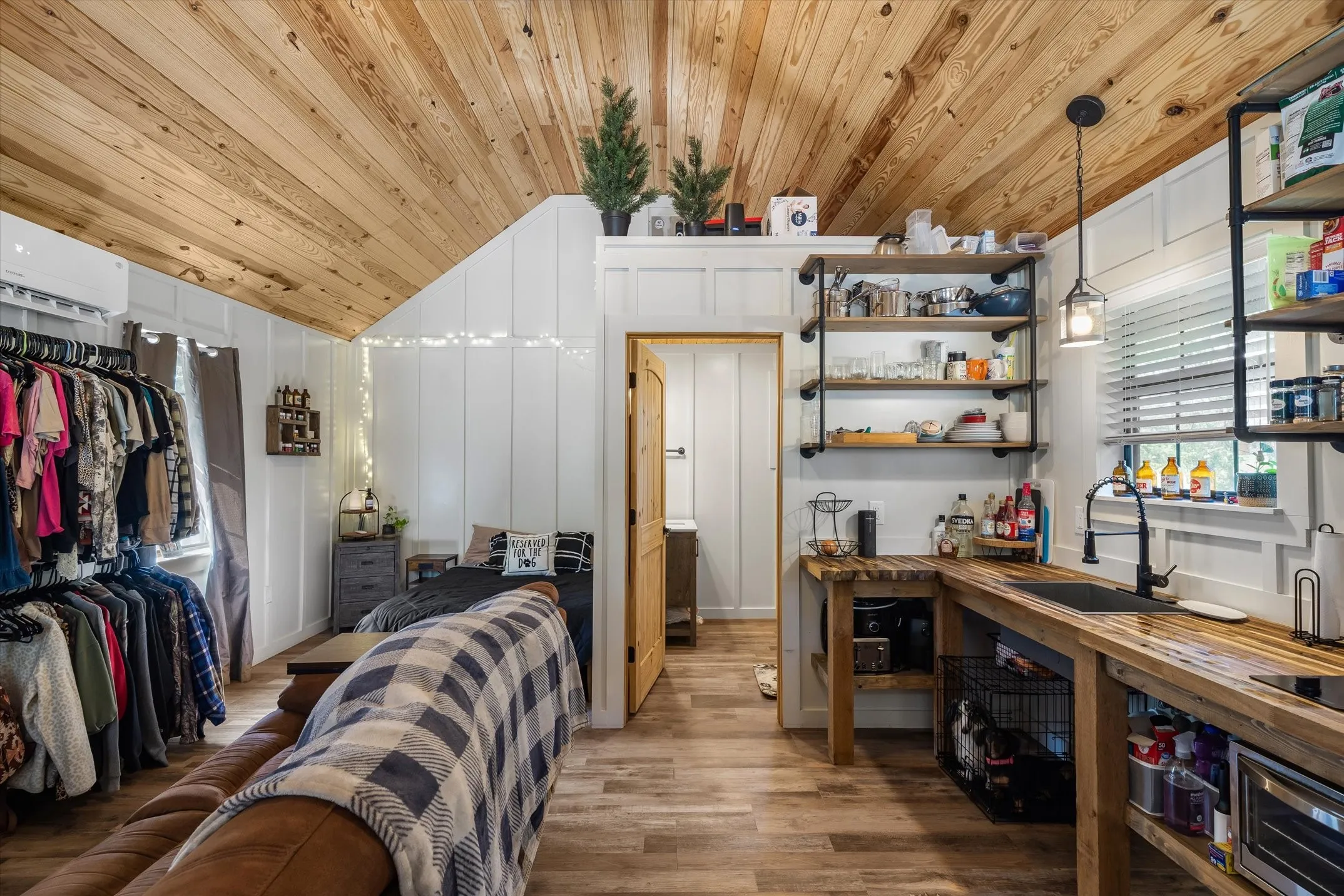 Super sweet tiny home with full bath and vaulted ceilings- perfect for a short term rental