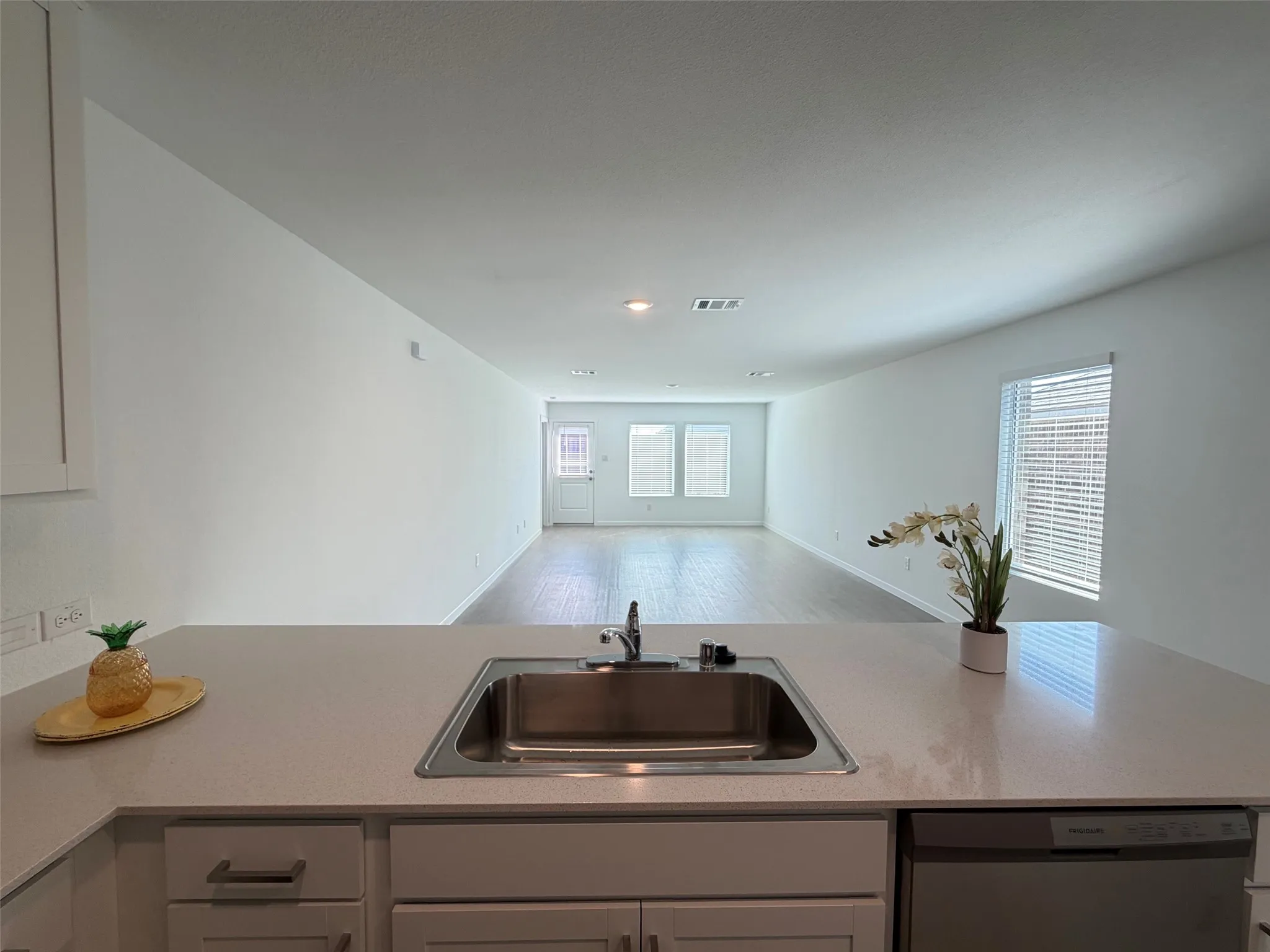 View of Dining and Living area from Kitchen.