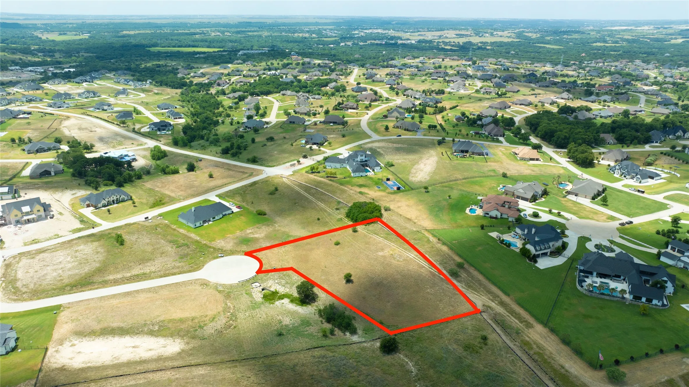 Vacant lot situated in a cul-de-sac featuring established neighborhood topography and open space