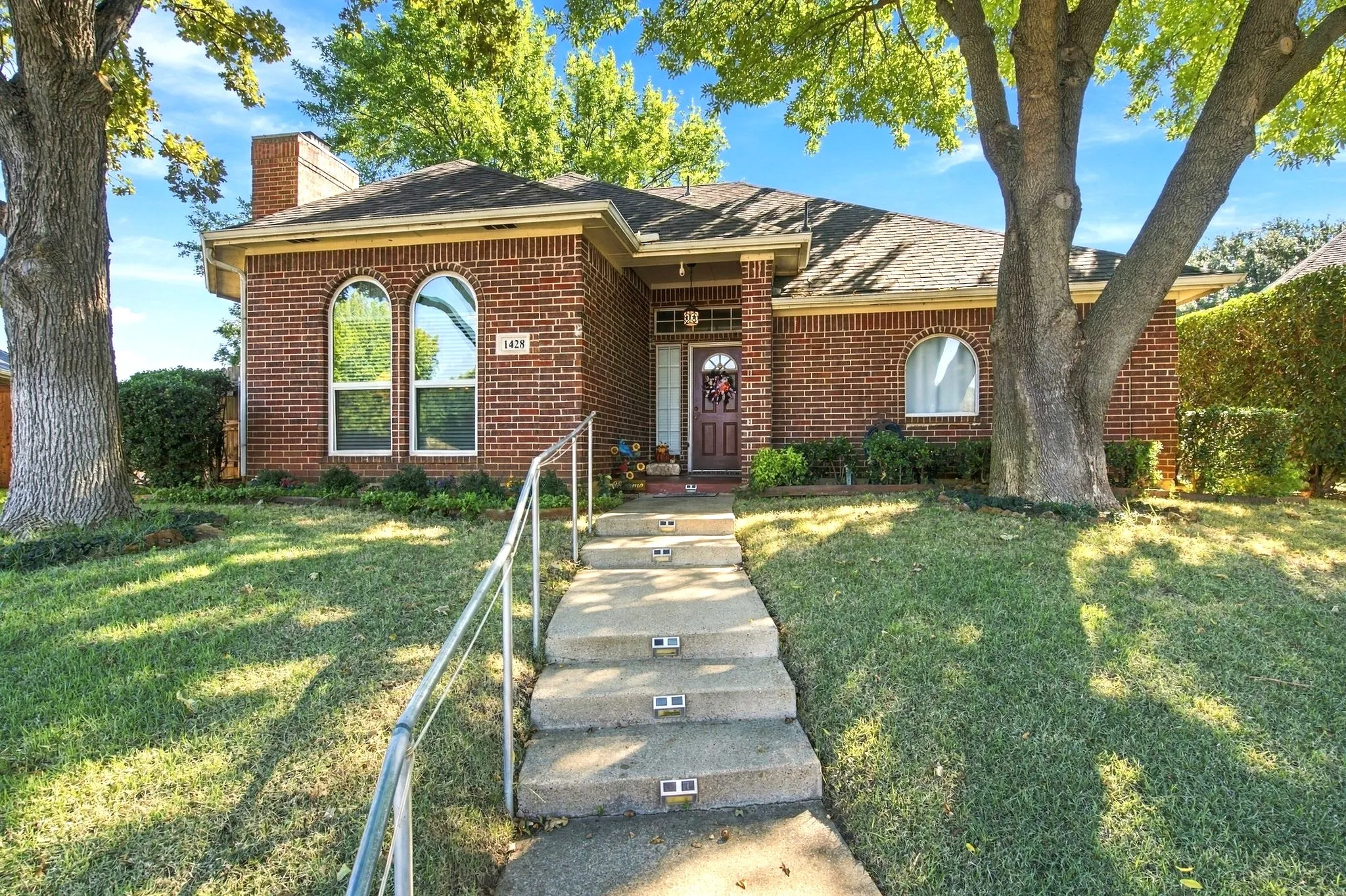 Front Porch Entry and Side. Gutters.