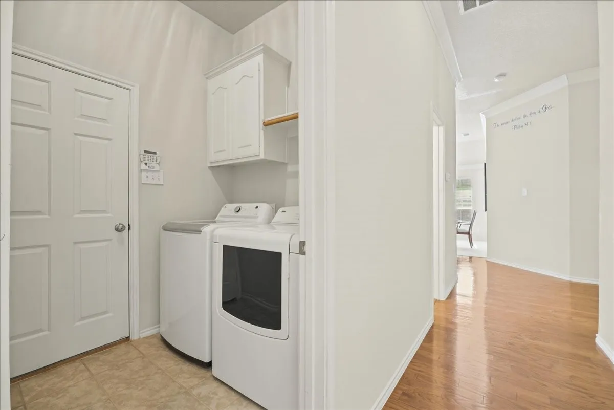 Utility room with extra cabinetry