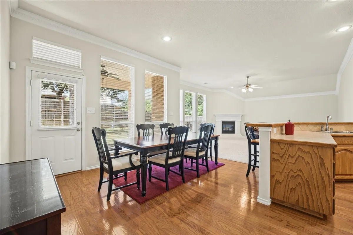 Breakfast area with door leading to the back patio