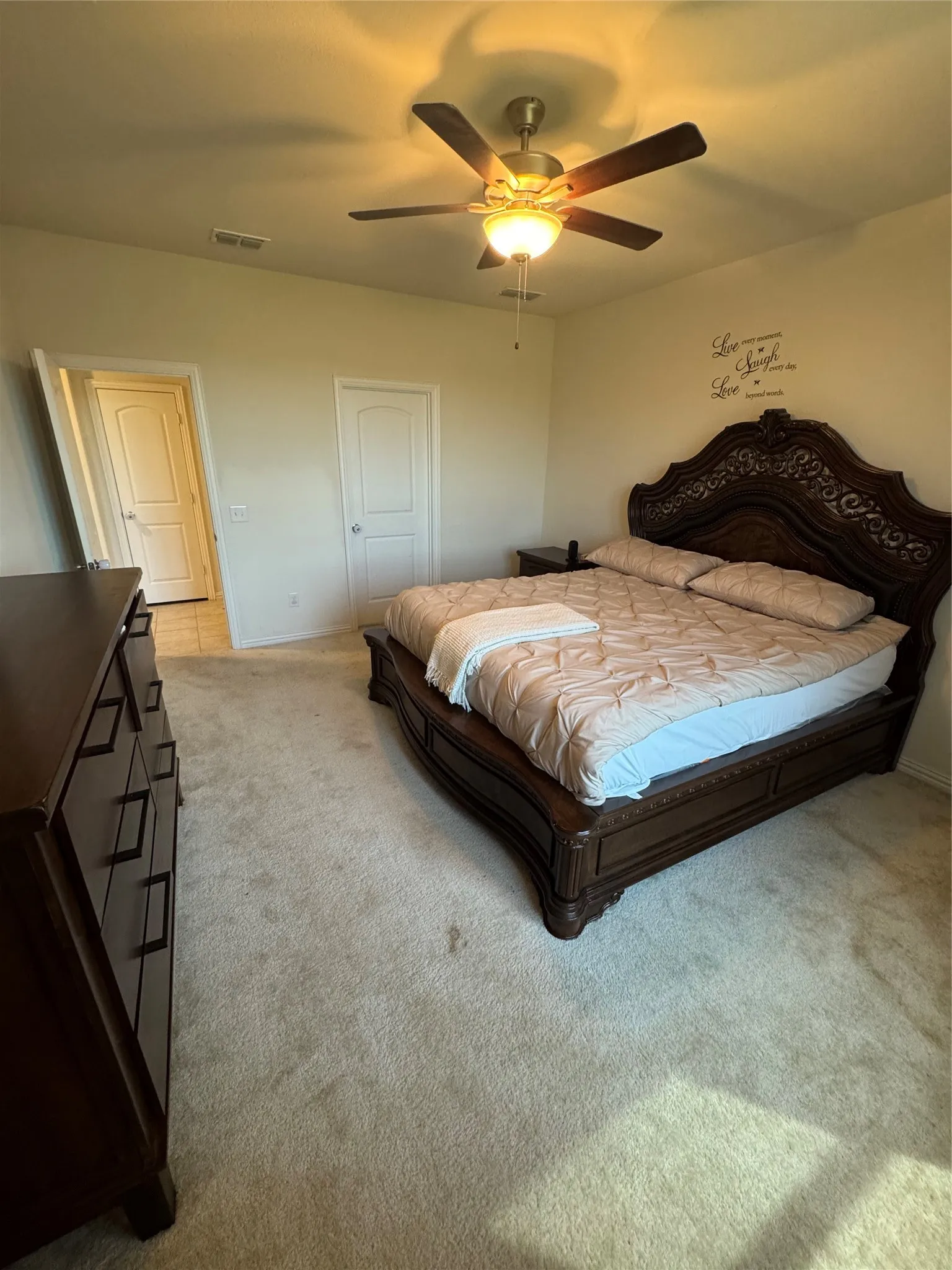 Spacious main bedroom area.