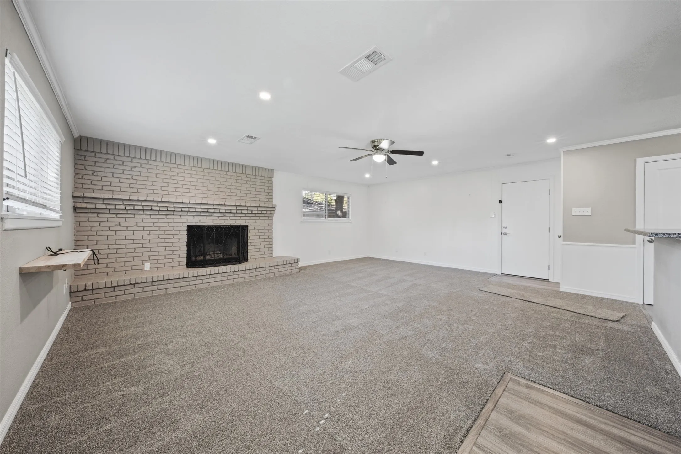 Big Family Room with woodburning fireplace.