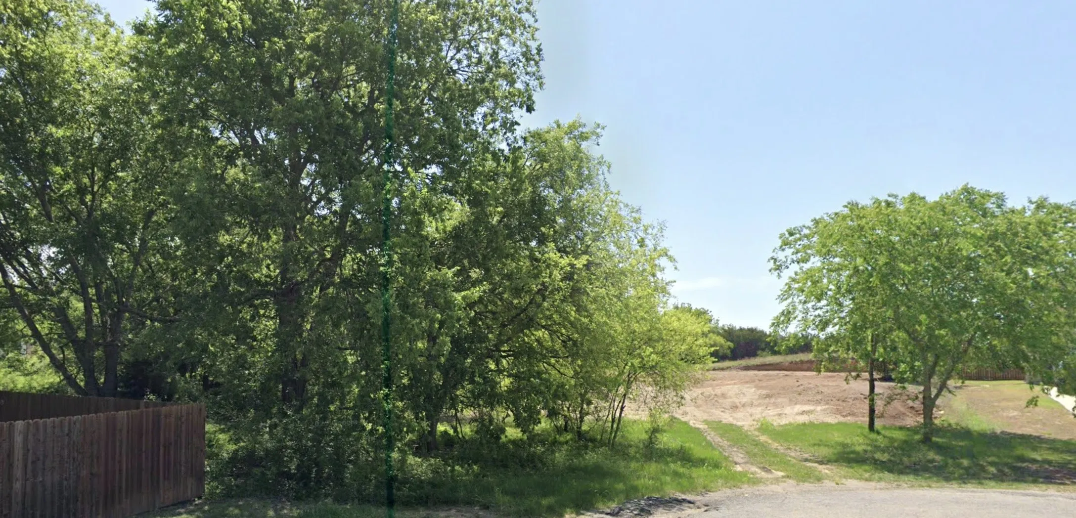 Street view of front of lot.