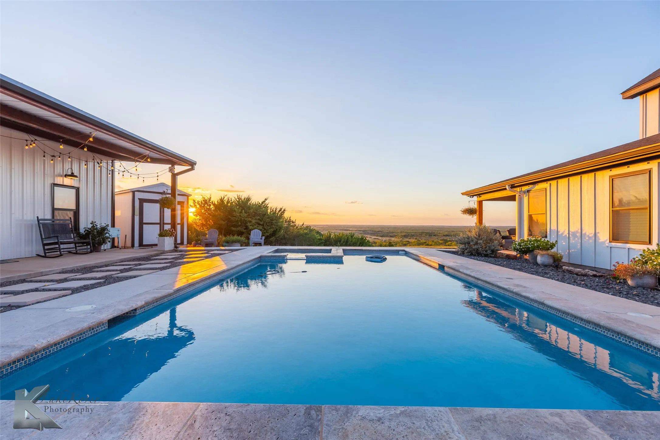 Pool with Workshop & Man Cave to left - House to the right