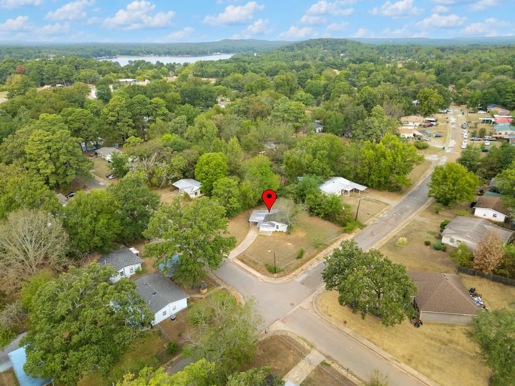Single Family Residence For Sale in Morris County , 241 Byrne Avenue, Lone Star, Texas 75668, 2 Bedroom, 1 Bathroom, Garage spaces, 714 Sqft, built in 1955, mls#21399062, Real Estate Agent in Lone Star, Homes For Sale in Morris county, Homes For Sale in Lone Star, Realtor in Lone Star Texas, Real Estate Brokerage Independent Realty Texas, Luminita Cordes Realtor