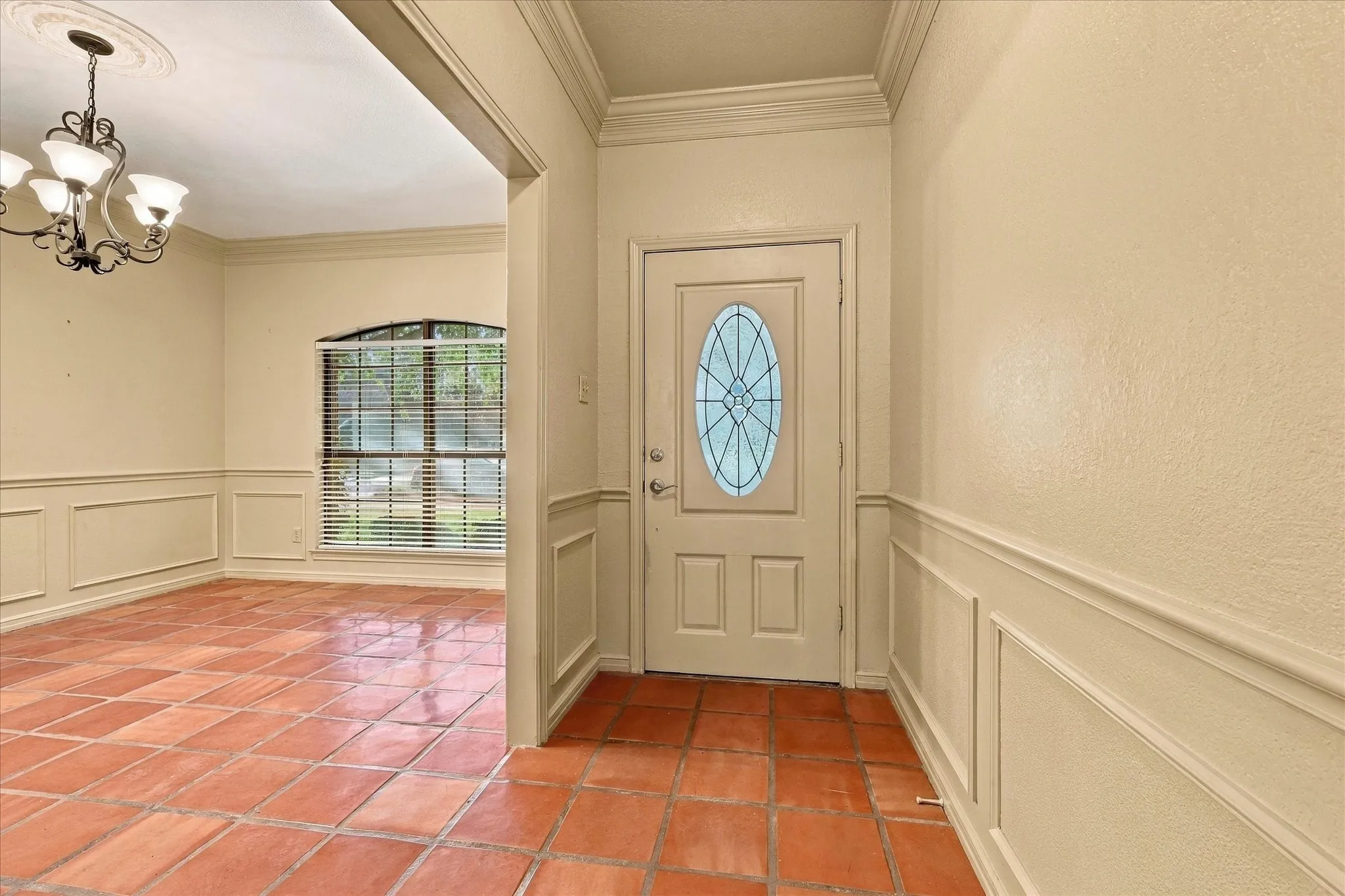 Entry with a view into the separate dining room.