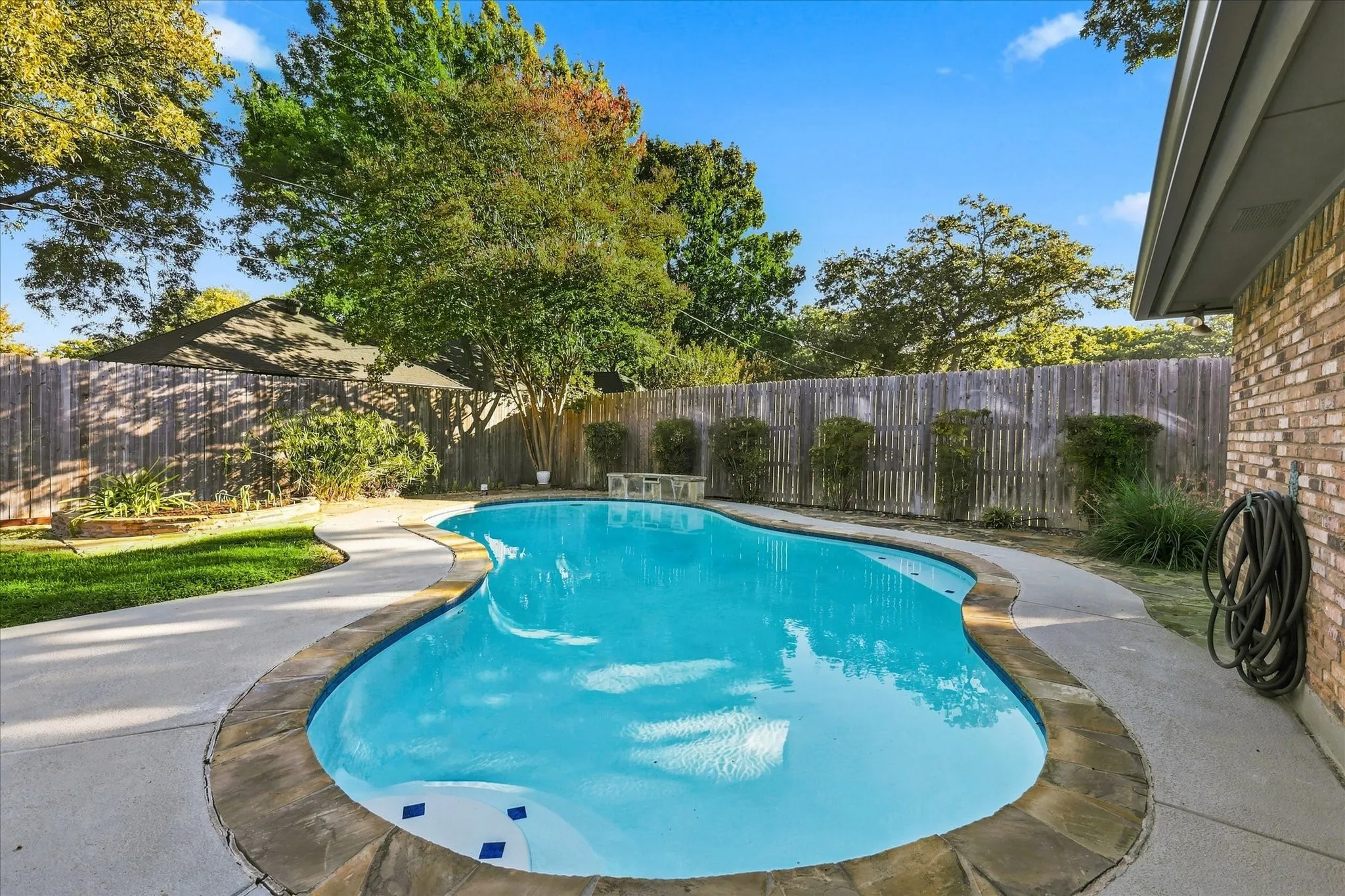  Pool with surrounding patio space.