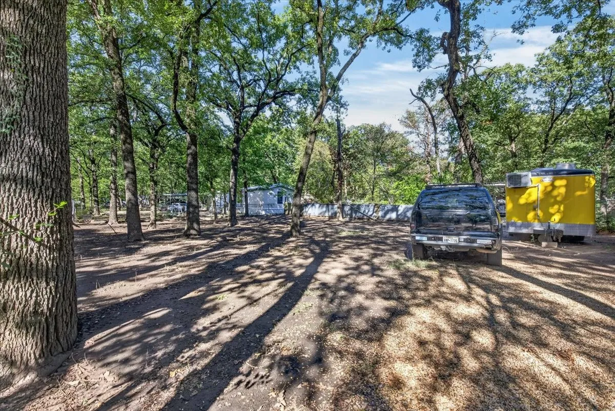 Mobile Home For Sale in Henderson County , 128 Butler Trail, Gun Barrel City, Texas 75156, 2 Bedroom, 2 Bathroom, Garage spaces, 912 Sqft, built in 2005, mls#21416186, Real Estate Agent in Gun Barrel City, Homes For Sale in Henderson county, Homes For Sale in Gun Barrel City, Realtor in Gun Barrel City Texas, Real Estate Brokerage Independent Realty Texas, Luminita Cordes Realtor