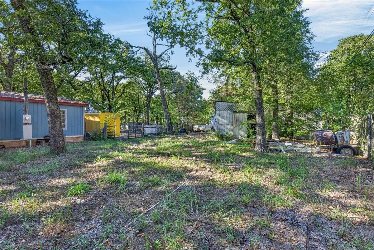 Mobile Home For Sale in Henderson County , 128 Butler Trail, Gun Barrel City, Texas 75156, 2 Bedroom, 2 Bathroom, Garage spaces, 912 Sqft, built in 2005, mls#21416186, Real Estate Agent in Gun Barrel City, Homes For Sale in Henderson county, Homes For Sale in Gun Barrel City, Realtor in Gun Barrel City Texas, Real Estate Brokerage Independent Realty Texas, Luminita Cordes Realtor