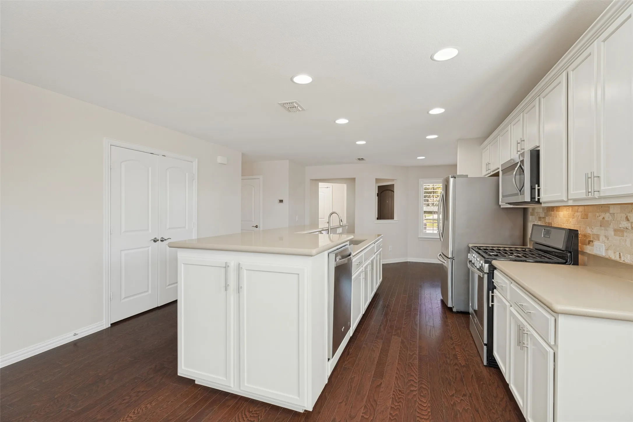 STORAGE CABINETS, RAISED DISHWASHER FOR CONVIENANCE