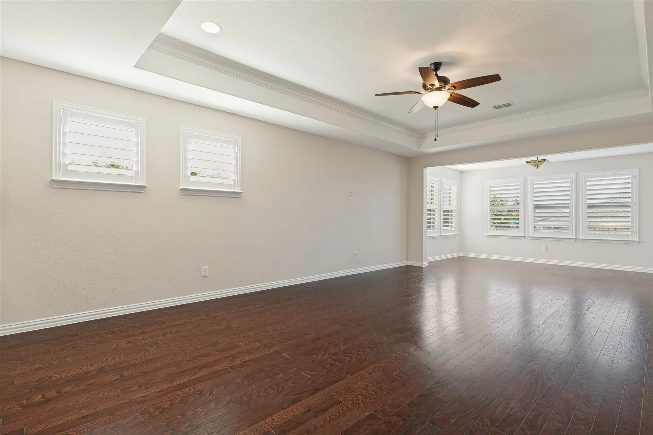CUSTOM 5 INCH PLANTATION SHUTTERS THROUGHOUT THE HOME