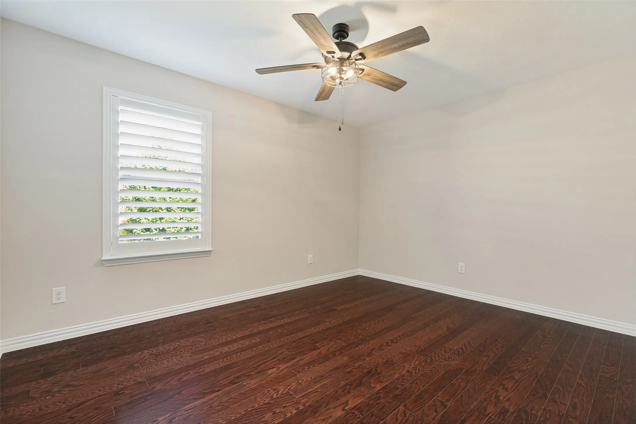 2ND BEDROOM WITH CEILING FAN AND  PLANTATION SHUTTERS