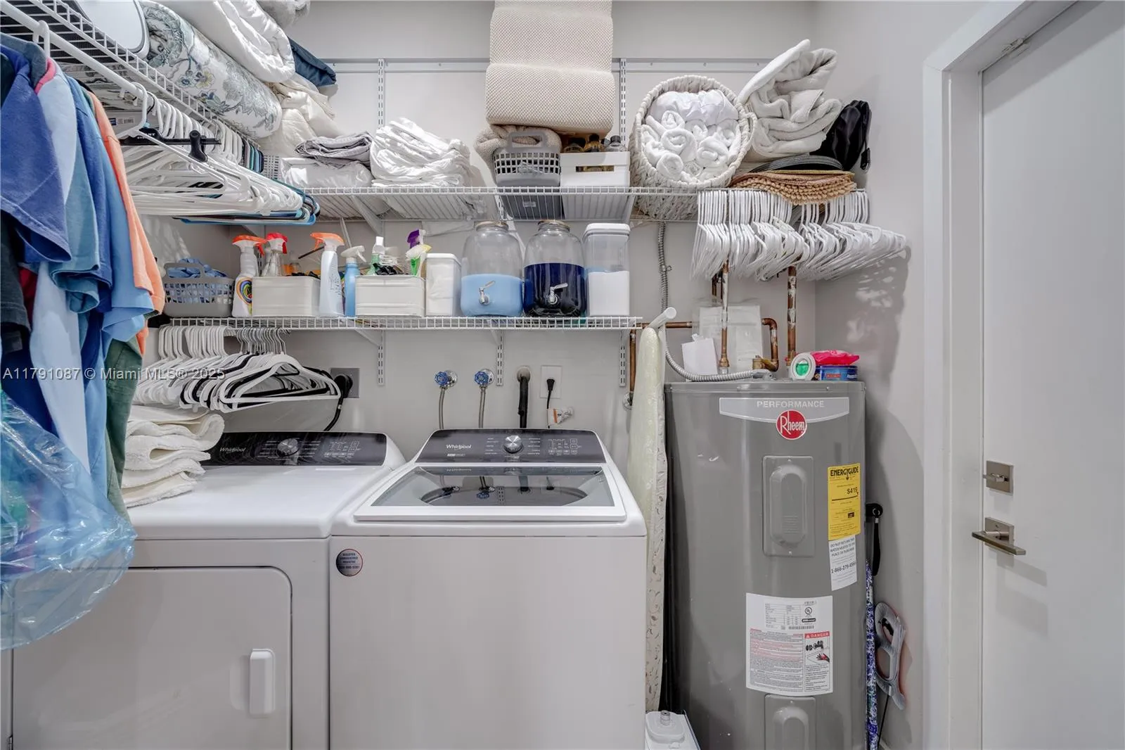 Separate air conditioned laundry room * Door leading to the garage *