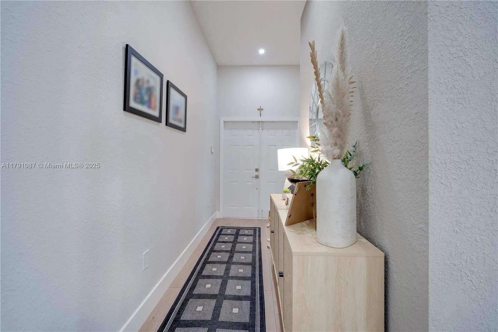 Double door foyer entry offering privacy, yet this is an open floor plan and feels light  & airy *