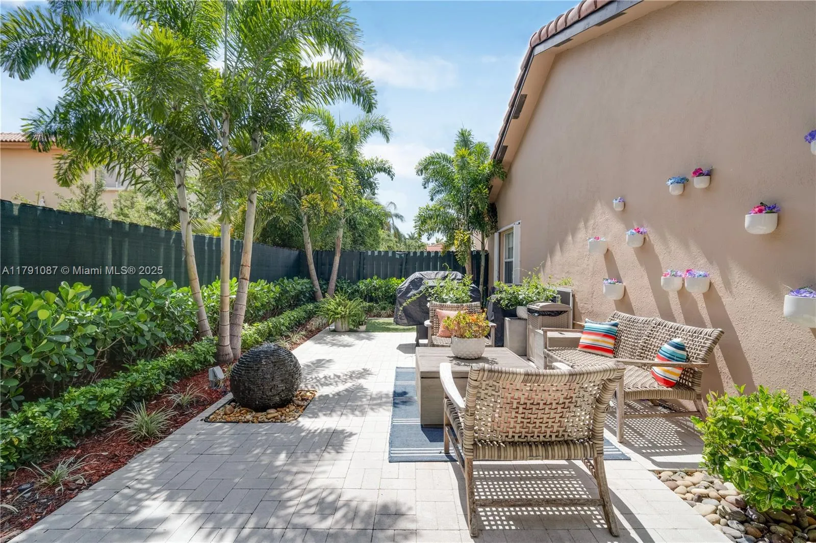 Back patio with another soothing water fountain  and so Zen-like *